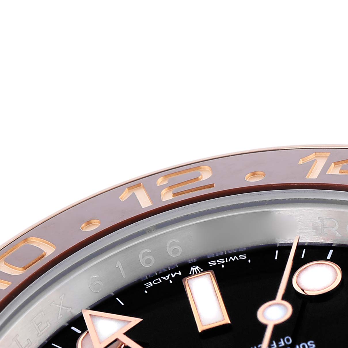 The image shows a close-up of the Rolex GMT-Master 126711 Men's Steel and Gold (two tone) Black Dial 126711 Men's Steel and Gold (two tone) Black Dial bezel, dial, and part of the hour markers and hands.