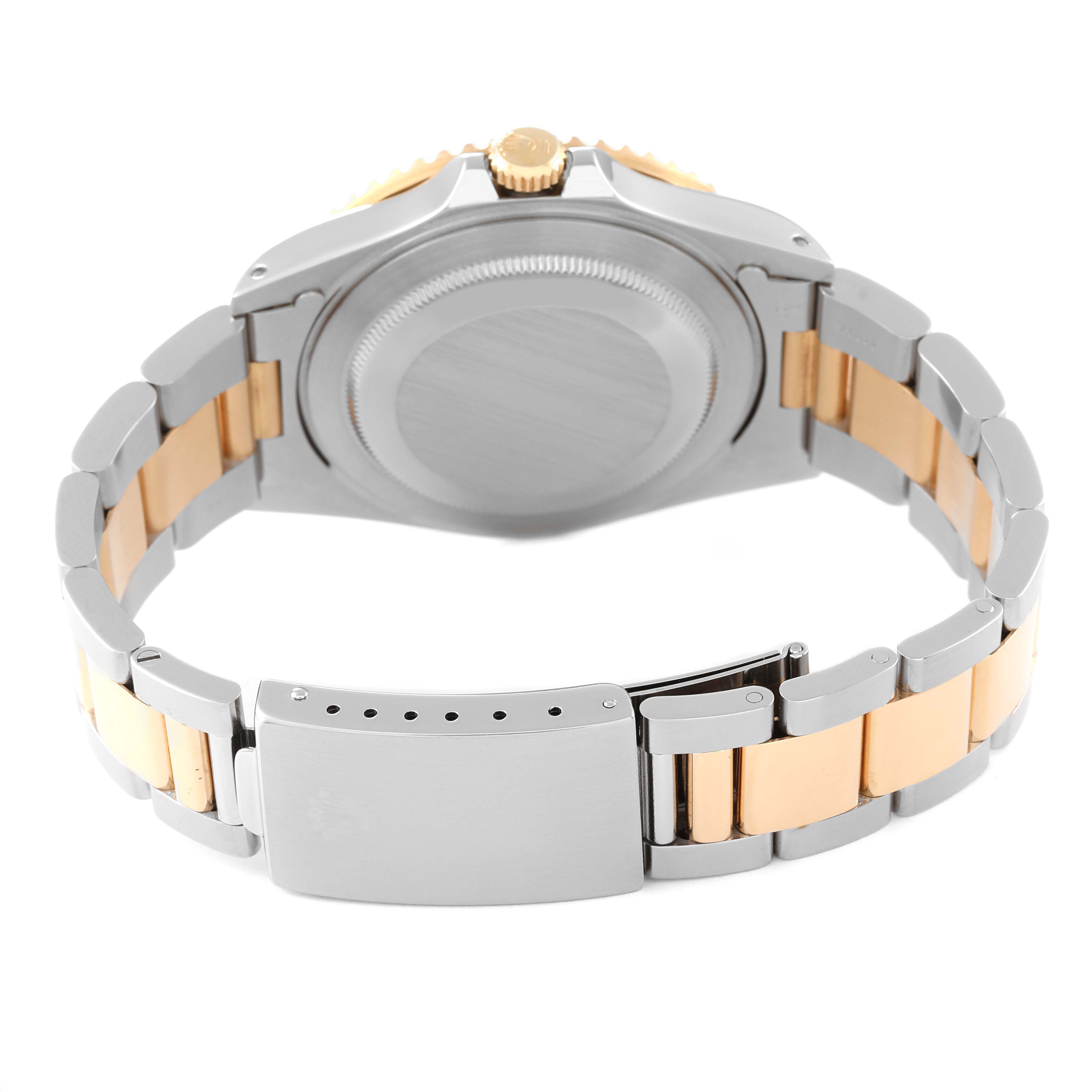 The image shows the back case and bracelet of a Rolex GMT-Master 16713 Men's Steel and Gold (two tone) Brown Dial 16713 Men's Steel and Gold (two tone) Brown Dial watch, viewed from the rear.