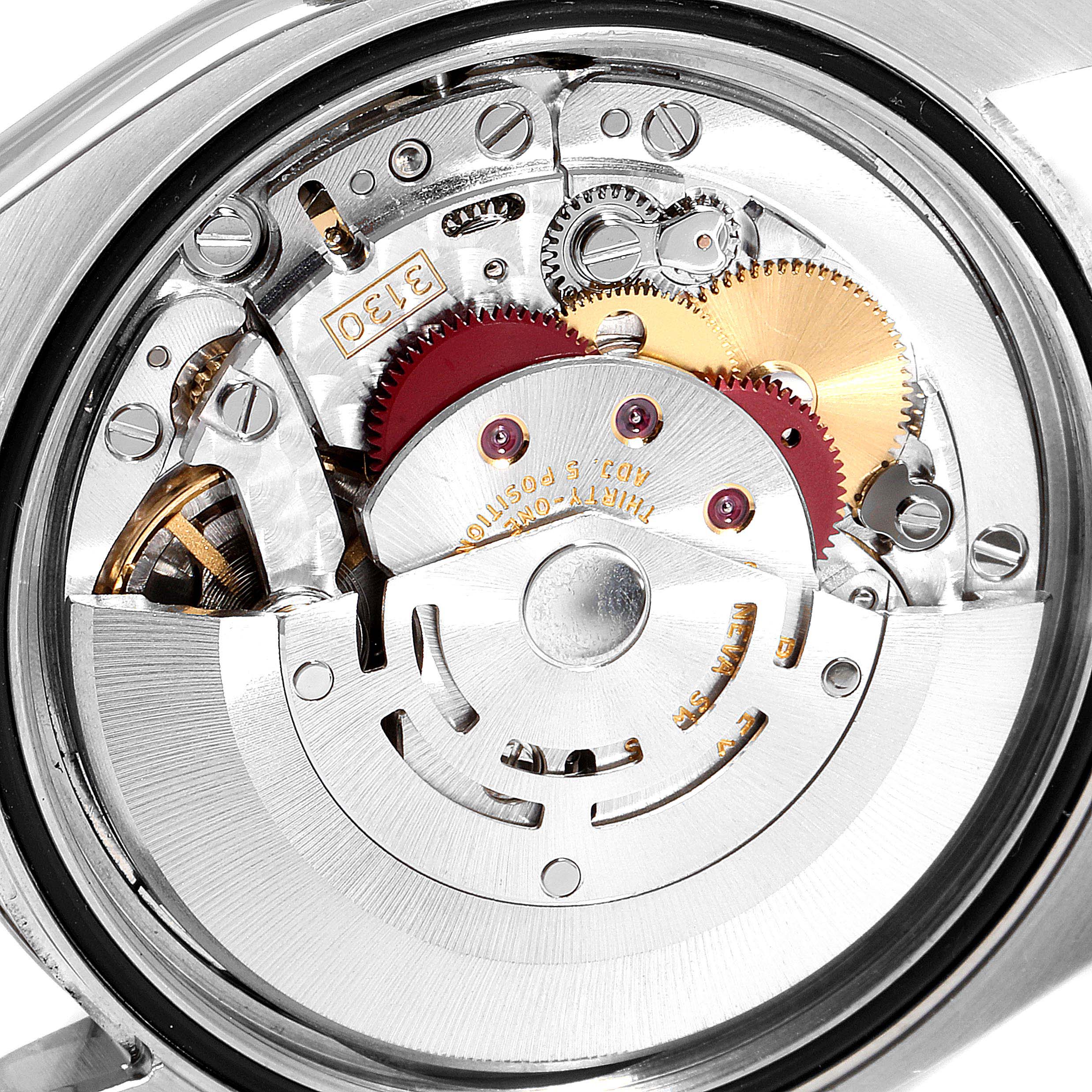 This image shows the internal mechanism of the Rolex Oyster Perpetual 116034 Men's Stainless Steel Blue Dial 116034 Men's Stainless Steel Blue Dial watch from a rear angle.