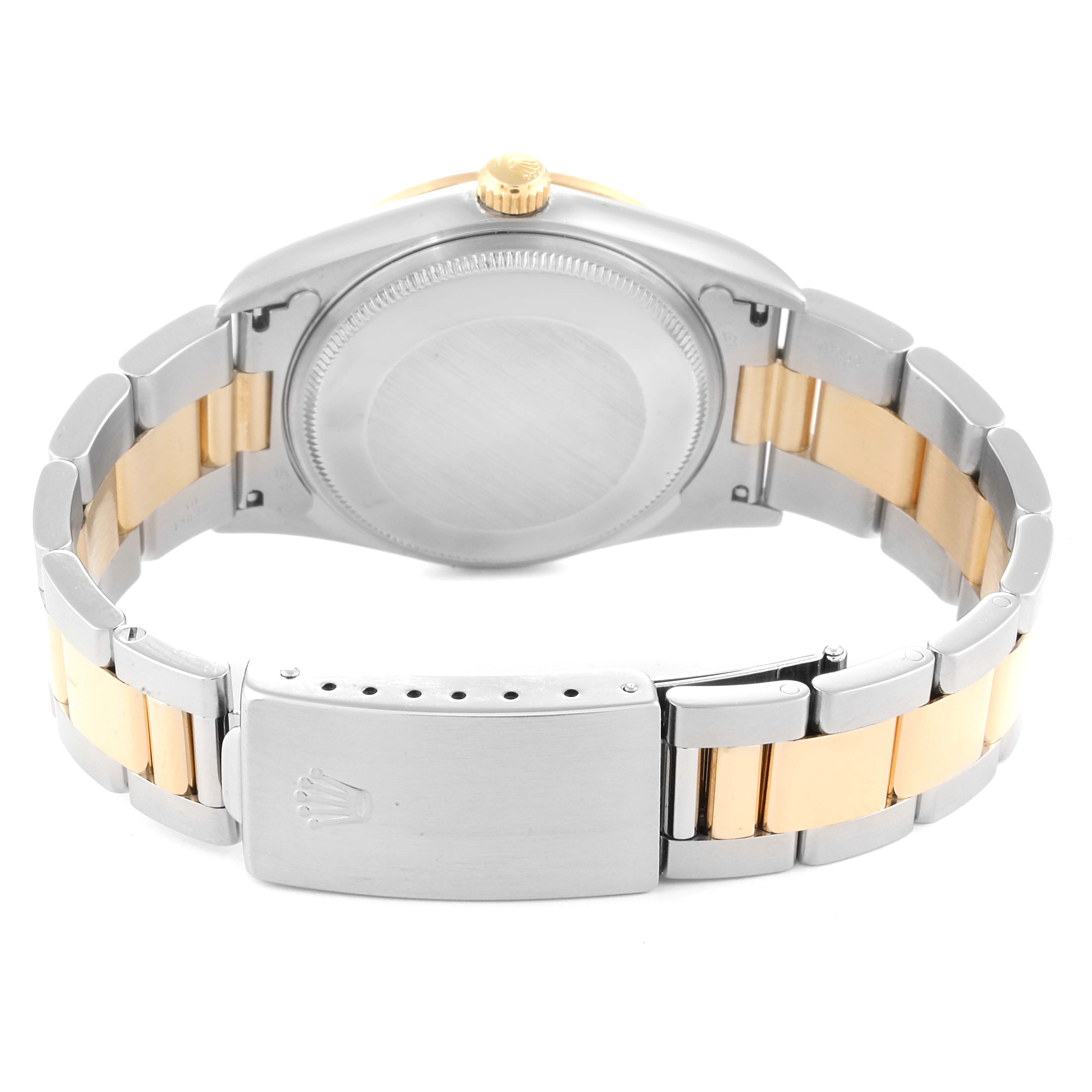 This image shows the back of a Rolex Oyster Perpetual 14203 Men's Steel and Gold (two tone) Grey Dial 14203 Men's Steel and Gold (two tone) Grey Dial watch, including the case back, bracelet, and clasp.