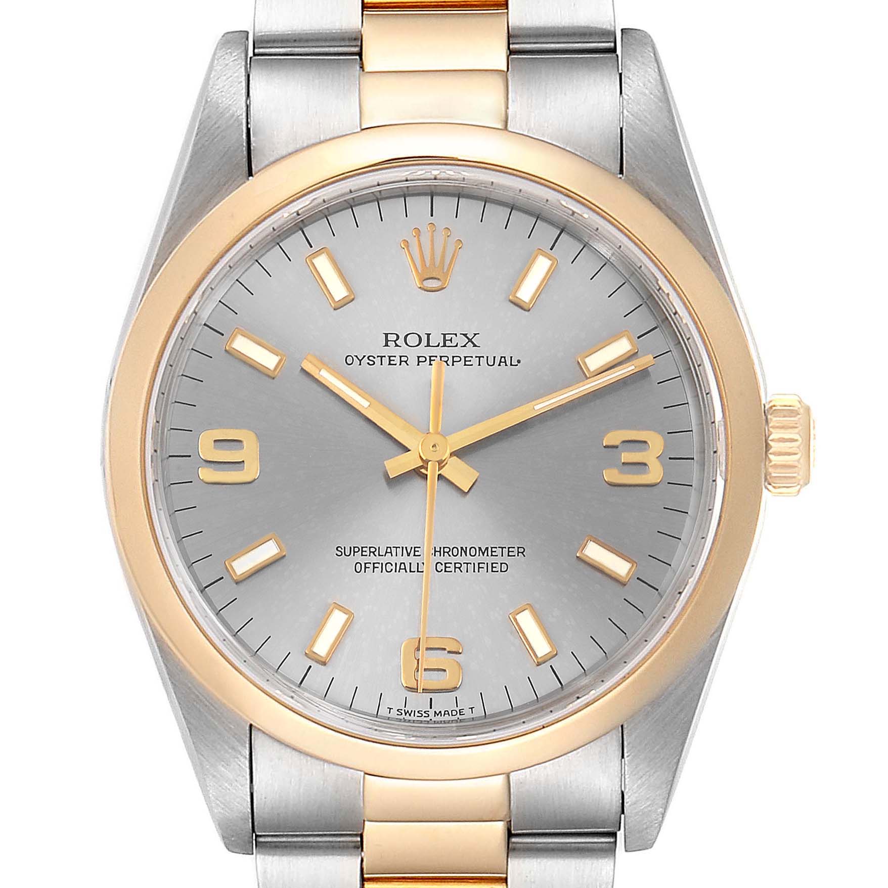 The image shows a front view of the Rolex Oyster Perpetual 14203 Men's Steel and Gold (two tone) Grey Dial 14203 Men's Steel and Gold (two tone) Grey Dial watch, highlighting its dial, hands, and part of its bracelet.