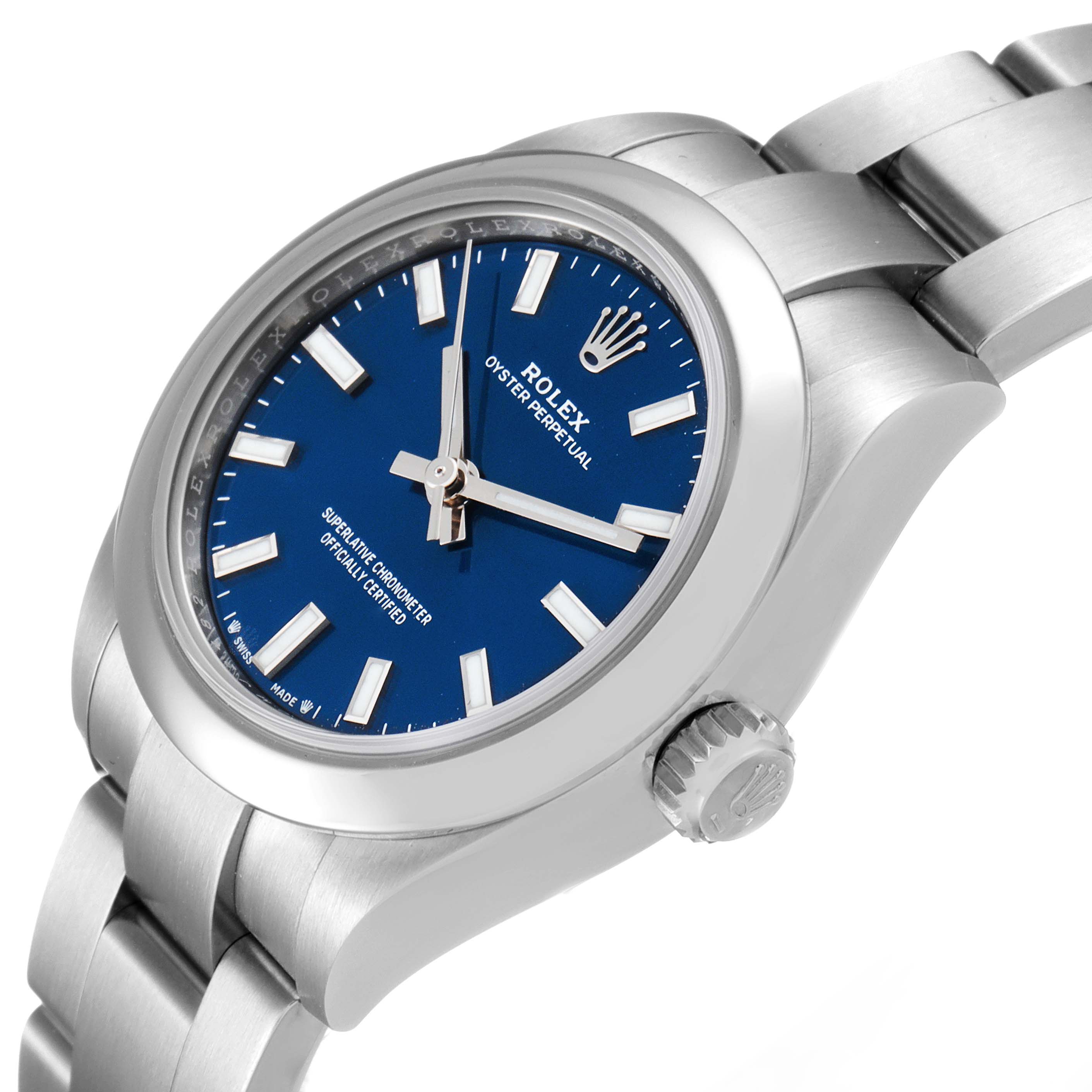 The image displays a Rolex Oyster Perpetual 276200 Women
s Stainless Steel Blue Dial 276200 Women
s Stainless Steel Blue Dial watch at an angled view, showing the blue dial, stainless steel case, crown, and part of the bracelet.