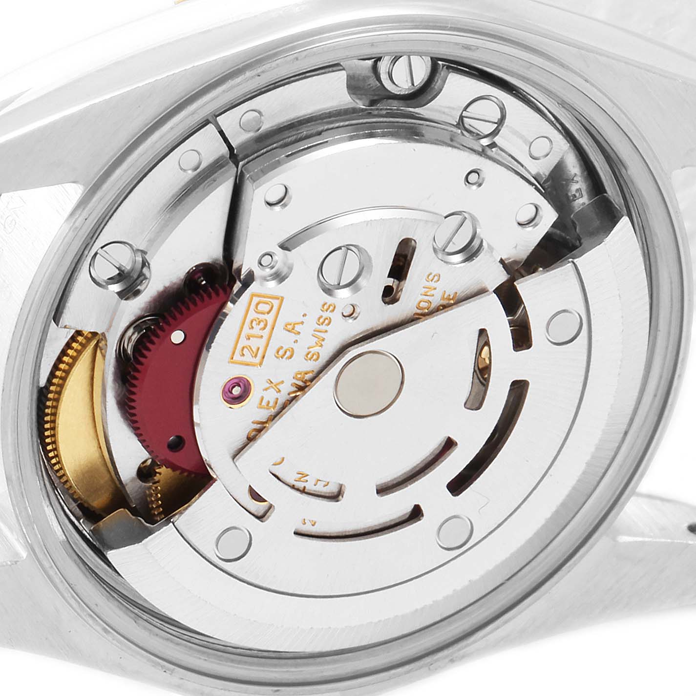 This image shows a close-up view of the movement mechanism inside a Rolex Oyster Perpetual 67243 Women's Steel and Gold (two tone) White Dial 67243 Women's Steel and Gold (two tone) White Dial watch.