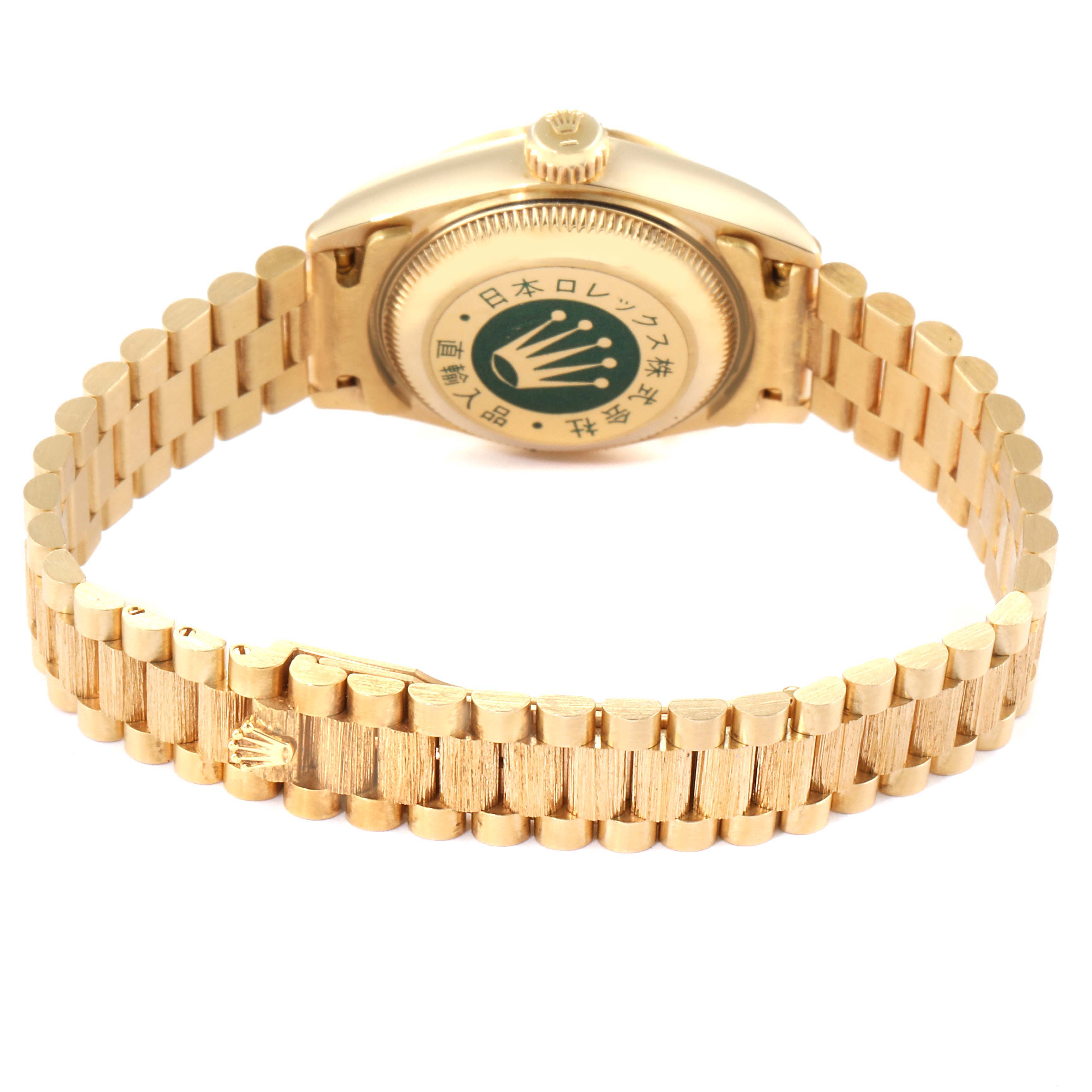 The image shows the back case and bracelet of a Rolex President 69278 Women
s Yellow Gold Champagne Dial 69278 Women
s Yellow Gold Champagne Dial model watch.