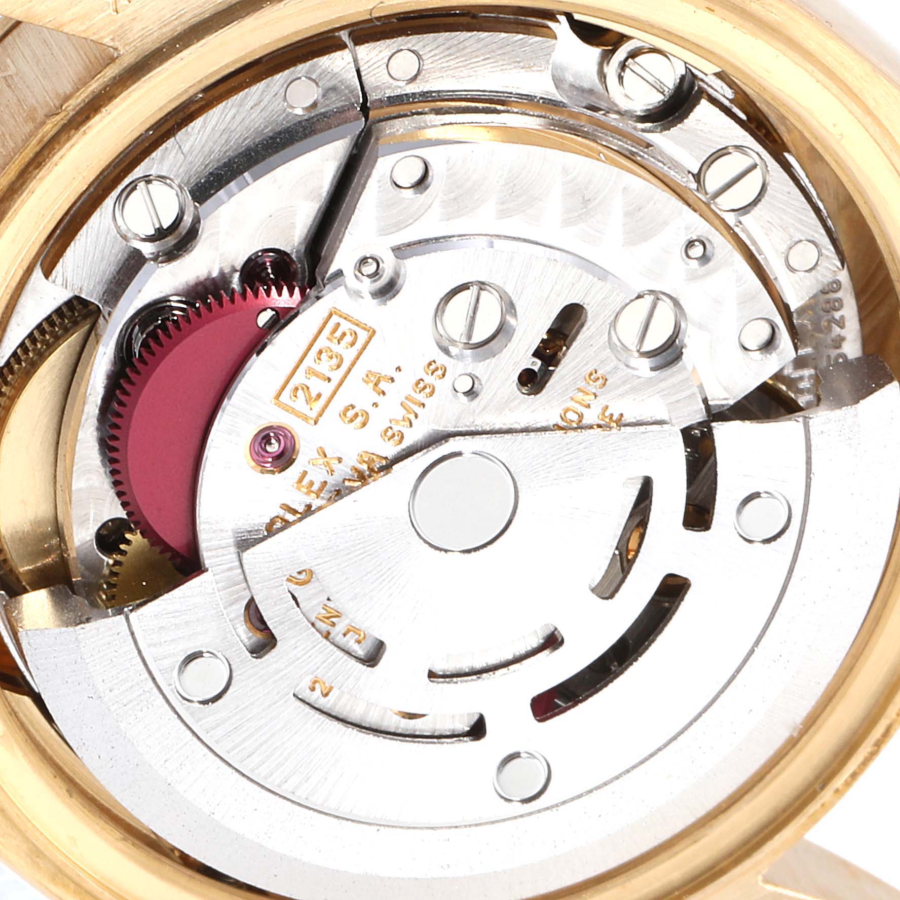 This is an image of the open movement mechanism of a Rolex President 69278 Women
s Yellow Gold Champagne Dial 69278 Women
s Yellow Gold Champagne Dial model watch, showing internal gears and components.