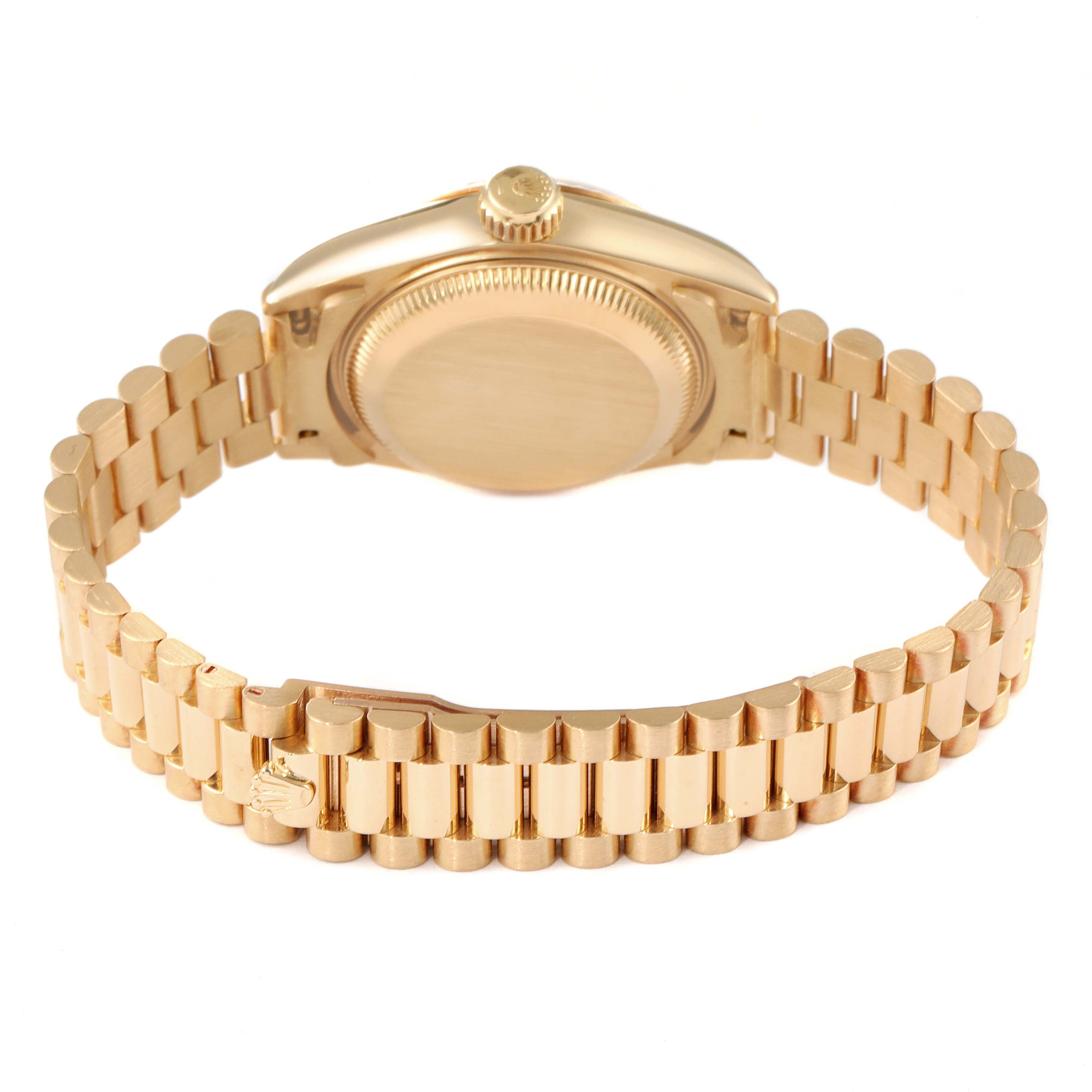 The Rolex President 69178 Women's Yellow Gold Black Dial 69178 Women's Yellow Gold Black Dial model watch is shown from the back, highlighting its bracelet and caseback.