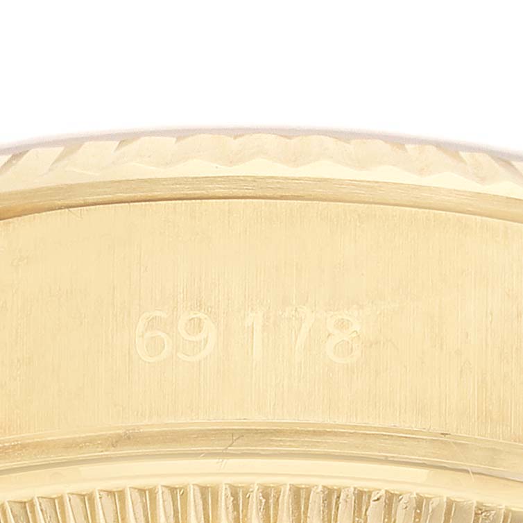 This image shows a close-up of the side of a Rolex President 69178 Women's Yellow Gold White Dial 69178 Women's Yellow Gold White Dial model with the engraved model number 69178.