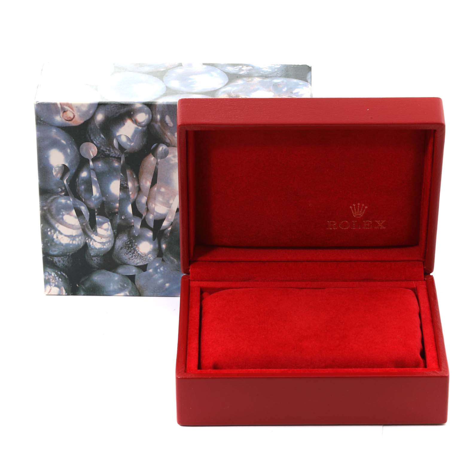 The image shows a red Rolex watch box, for the President model, with an outer decorative box behind it.
