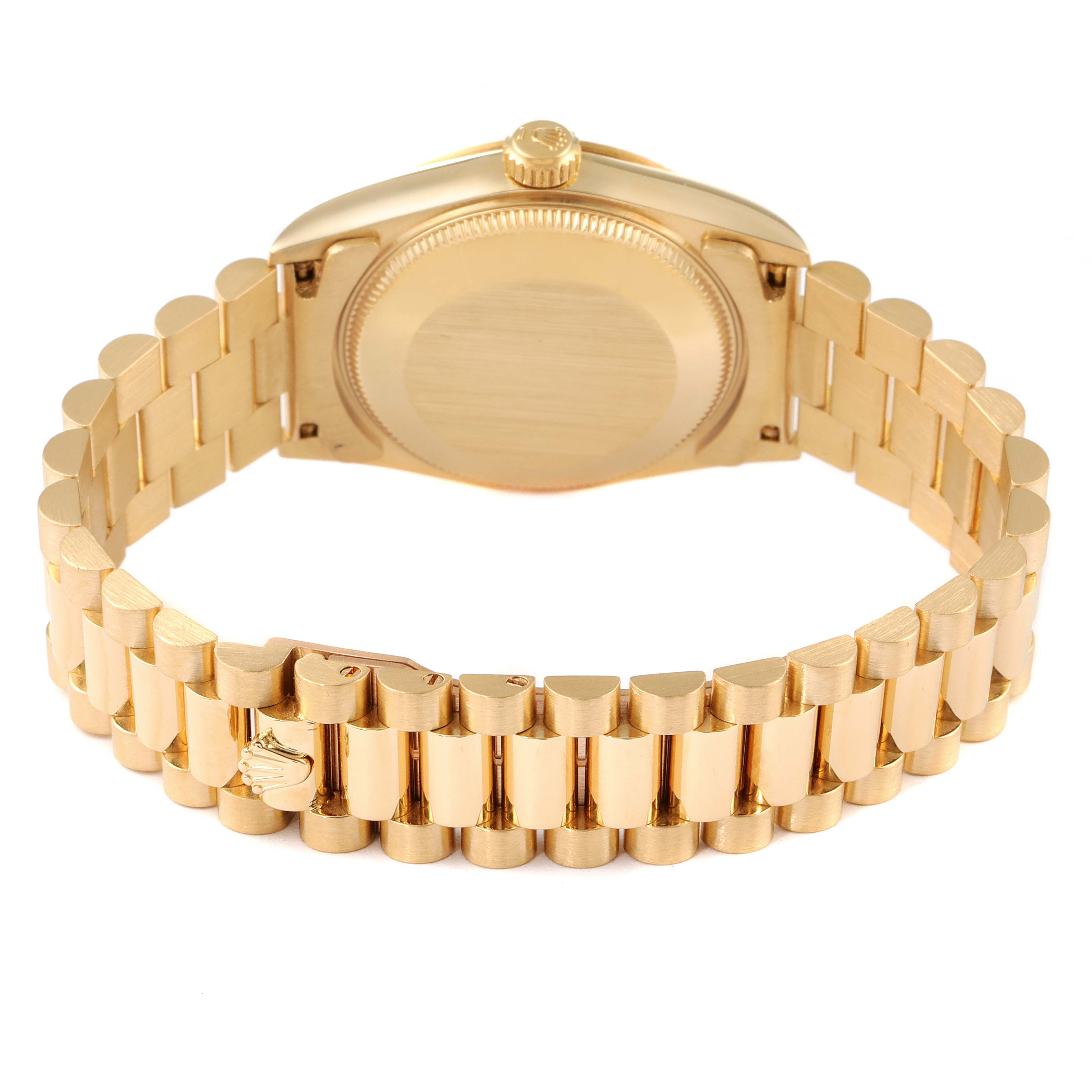 The image shows the back of the Rolex President 68278 Women
s Yellow Gold Champagne Dial 68278 Women
s Yellow Gold Champagne Dial model watch, focusing on the case back and the gold bracelet.