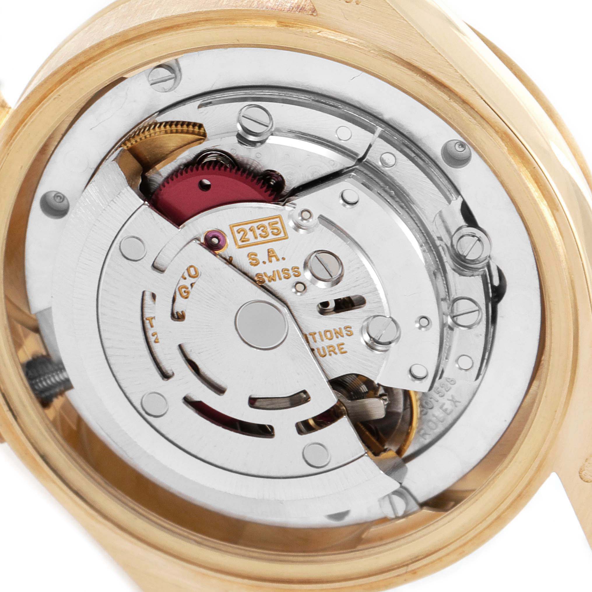The image shows a close-up view of the mechanical movement of a Rolex President 68278 Women
s Yellow Gold Champagne Dial 68278 Women
s Yellow Gold Champagne Dial model watch from the back.