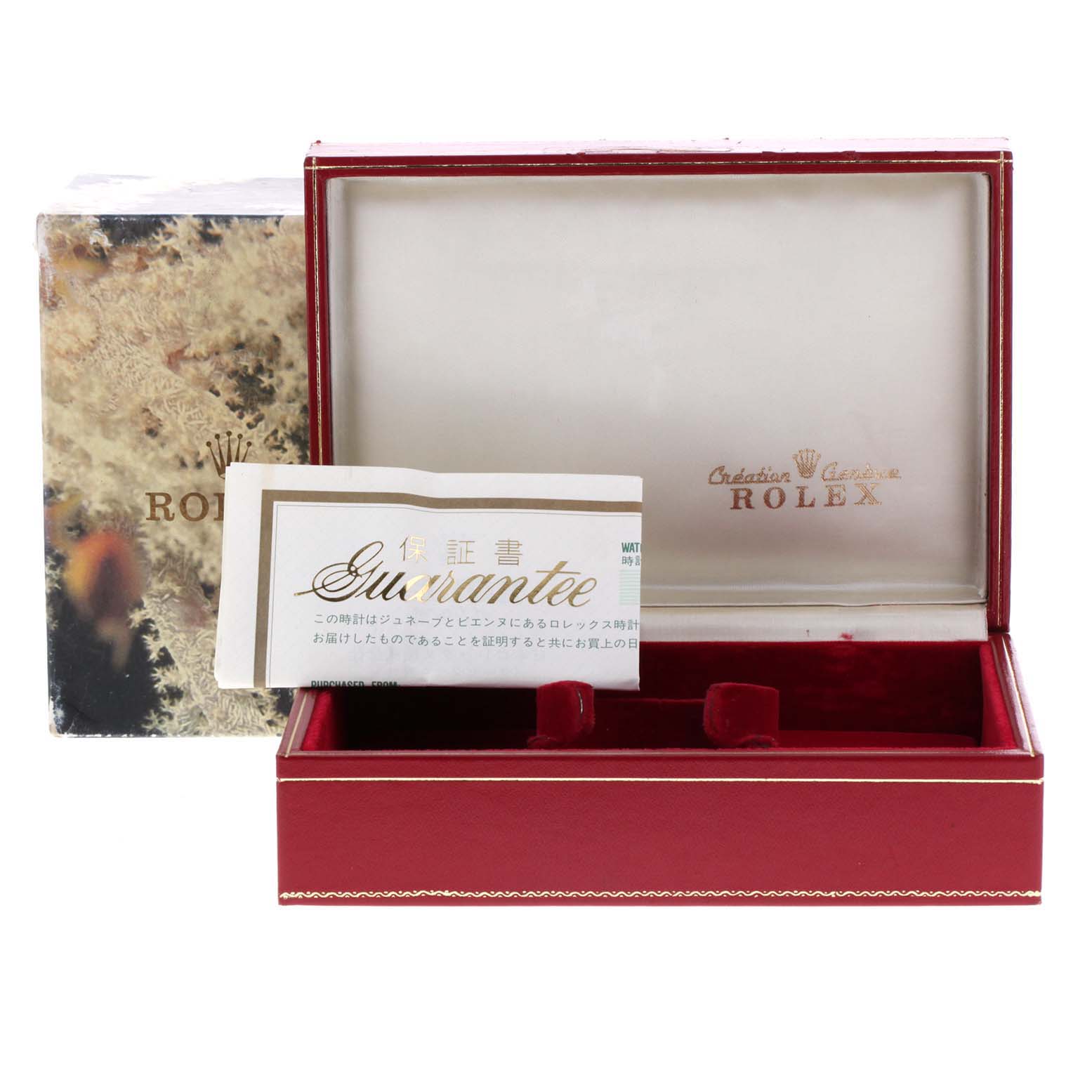 This image shows an open Rolex President 68278 Women
s Yellow Gold Champagne Dial 68278 Women
s Yellow Gold Champagne Dial watch box with a "Guarantee" certificate placed inside.