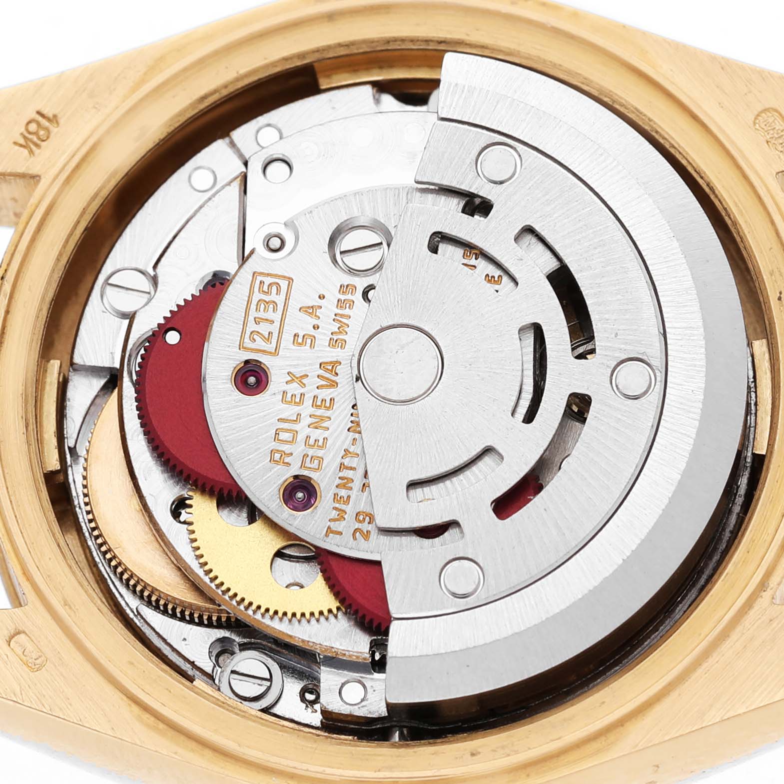 The image shows the inner mechanics of a Rolex President 69278 Women's Yellow Gold Champagne Dial watch from a top-down angle, highlighting its movement components.