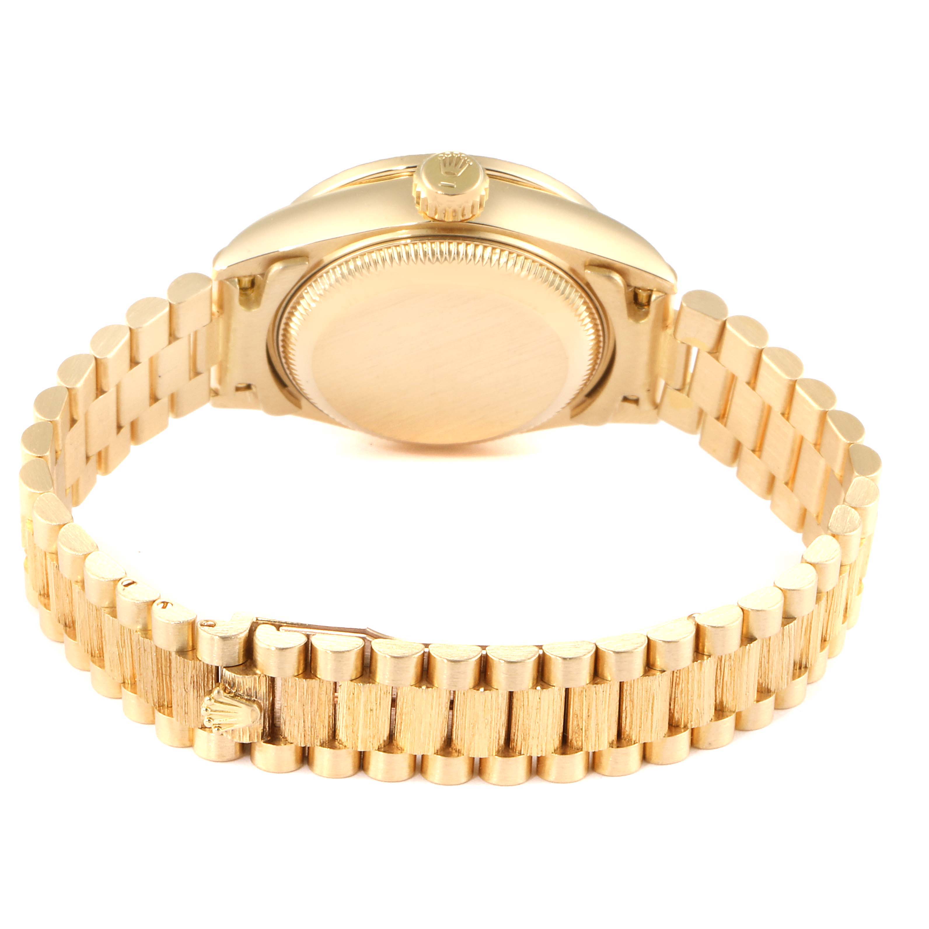 The image shows the back case and bracelet of a Rolex President 69288 Women
s Yellow Gold Champagne Dial 69288 Women
s Yellow Gold Champagne Dial model watch viewed at an angle from the rear.