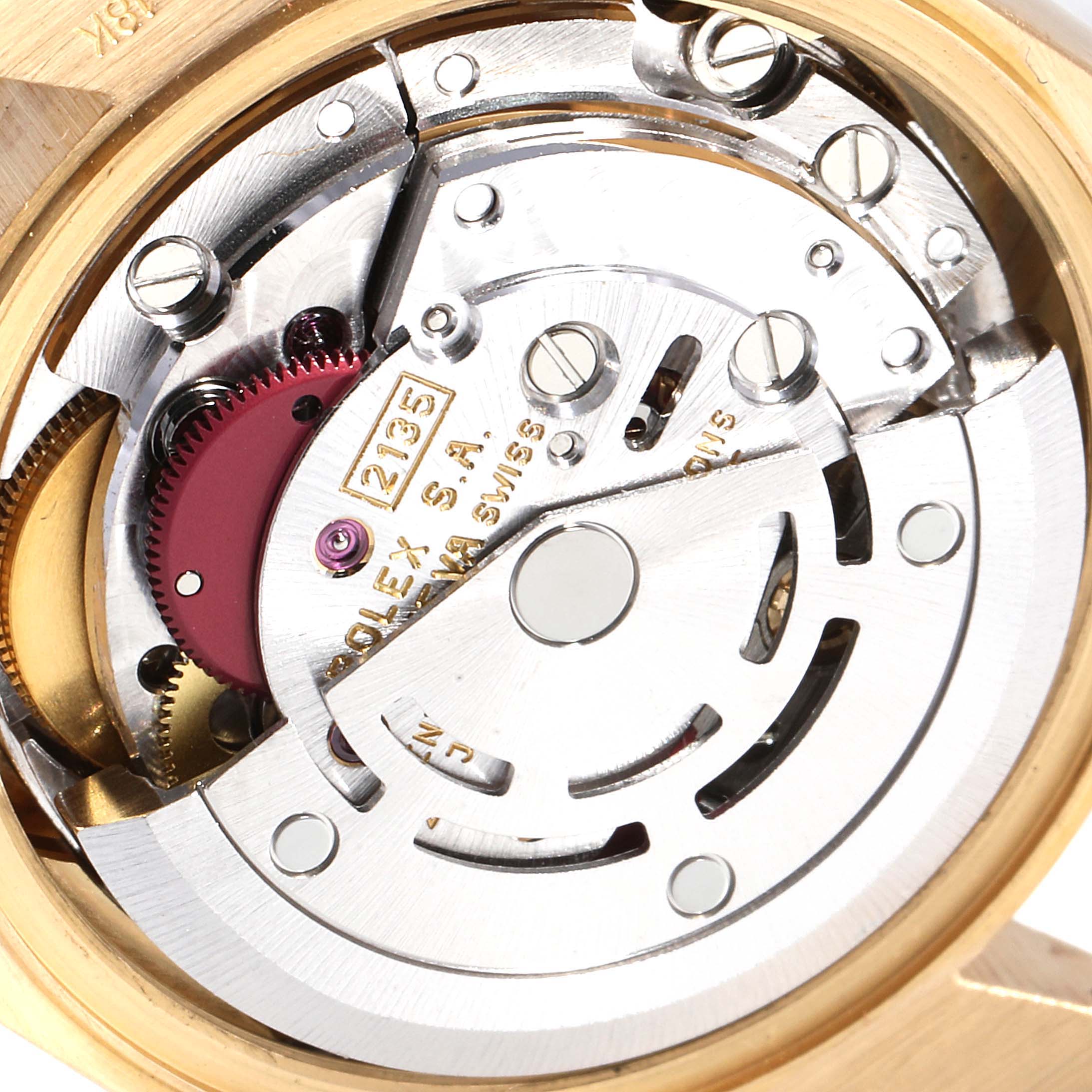 This image shows the internal mechanism of a Rolex President 69288 Women
s Yellow Gold Champagne Dial 69288 Women
s Yellow Gold Champagne Dial model, specifically focusing on the movement and rotor from a close-up angle.