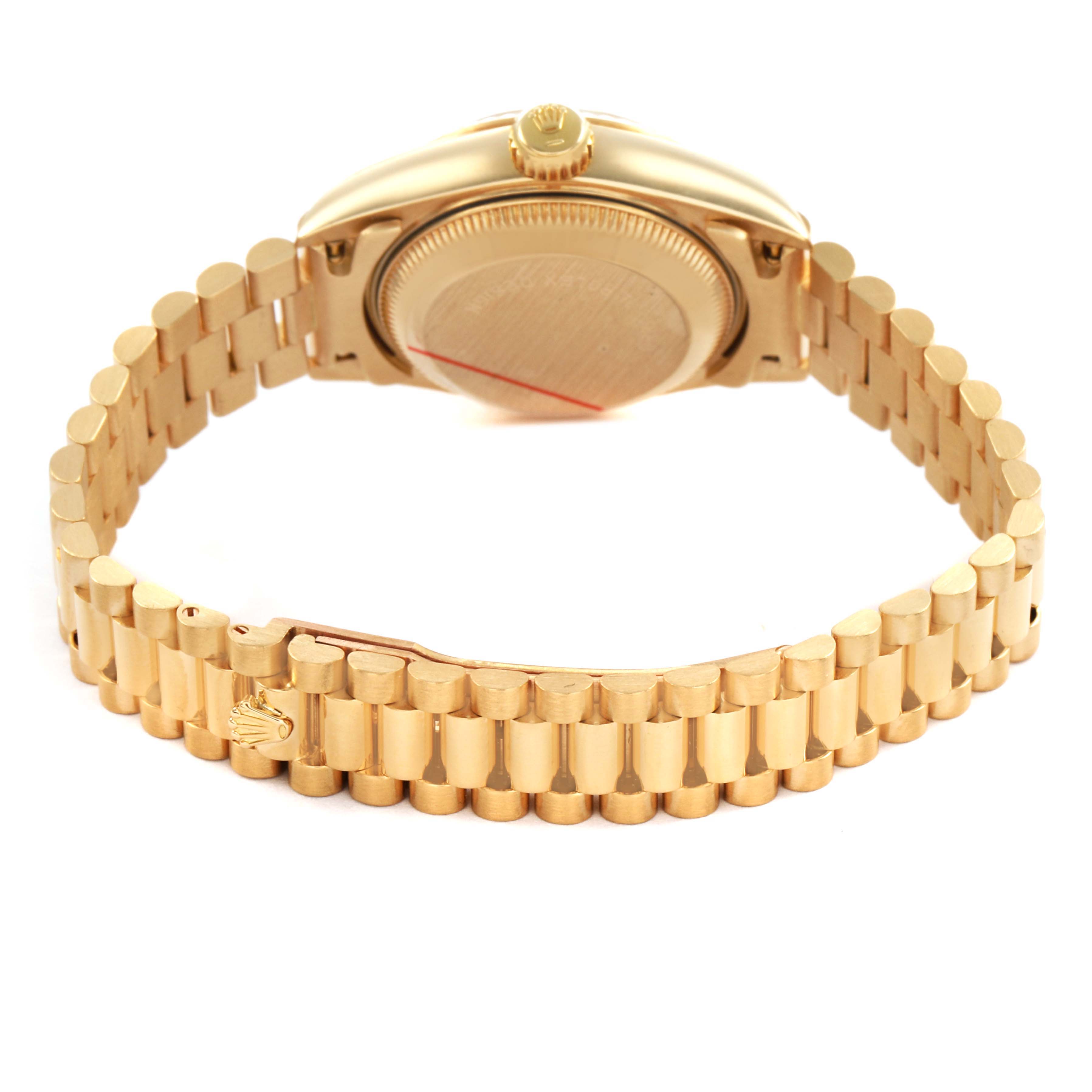 The Rolex President 69178 Womens Yellow Gold Yellow Dial model watch is shown from the back, highlighting the case back and the entire gold bracelet.