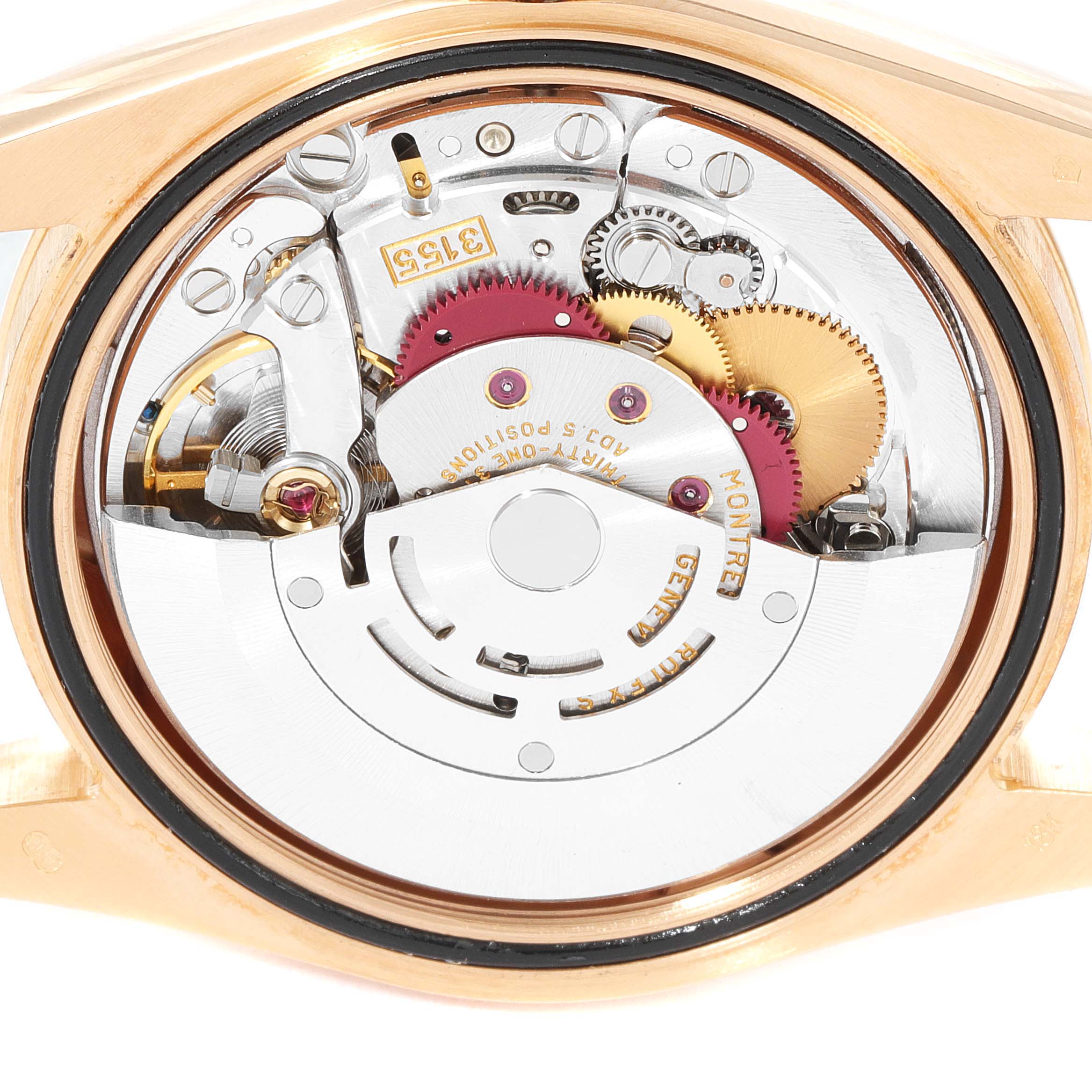 This image shows the back view of the inner mechanics and movement of a Rolex President 118205 Men's Rose Gold Silver Dial 118205 Men's Rose Gold Silver Dial model watch.