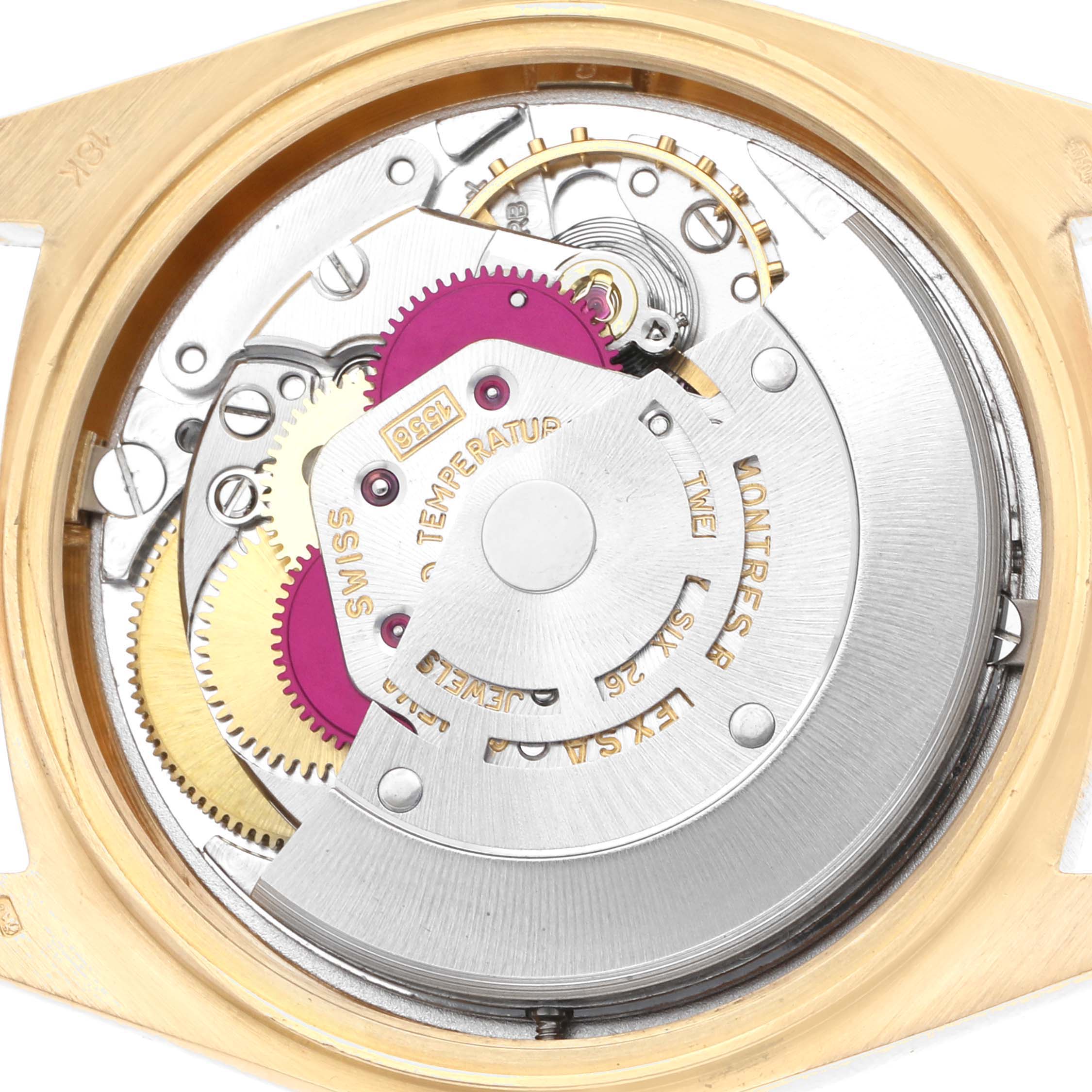 The image shows a close-up of the Rolex President 1803 Men
s Yellow Gold Champagne Dial 1803 Men
s Yellow Gold Champagne Dial model
s movement, highlighting its mechanical components and intricate details.