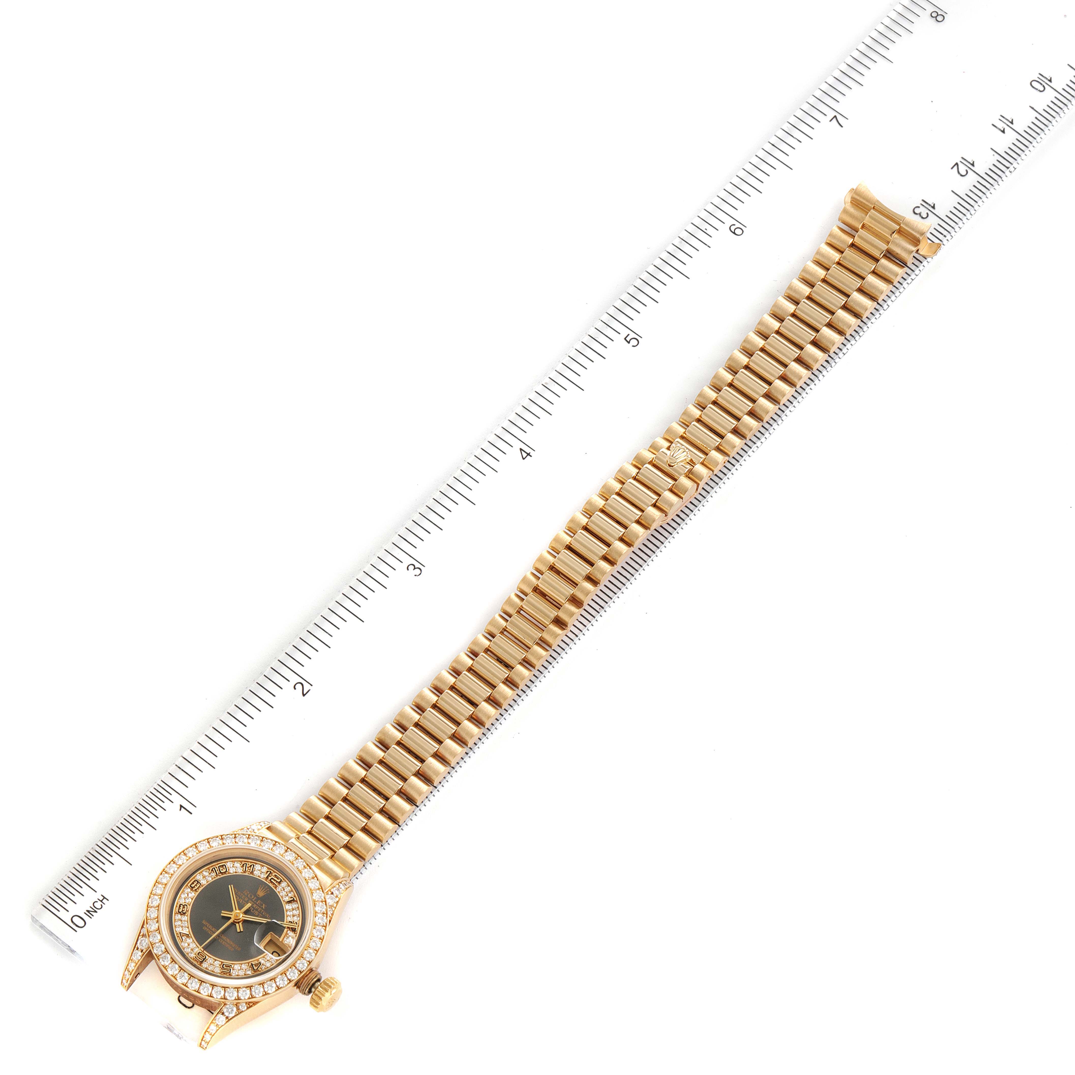This Rolex President 69158 Women's Yellow Gold Grey Dial 69158 Women's Yellow Gold Grey Dial model watch is displayed flat, showing the full bracelet and face alongside a ruler for scale.