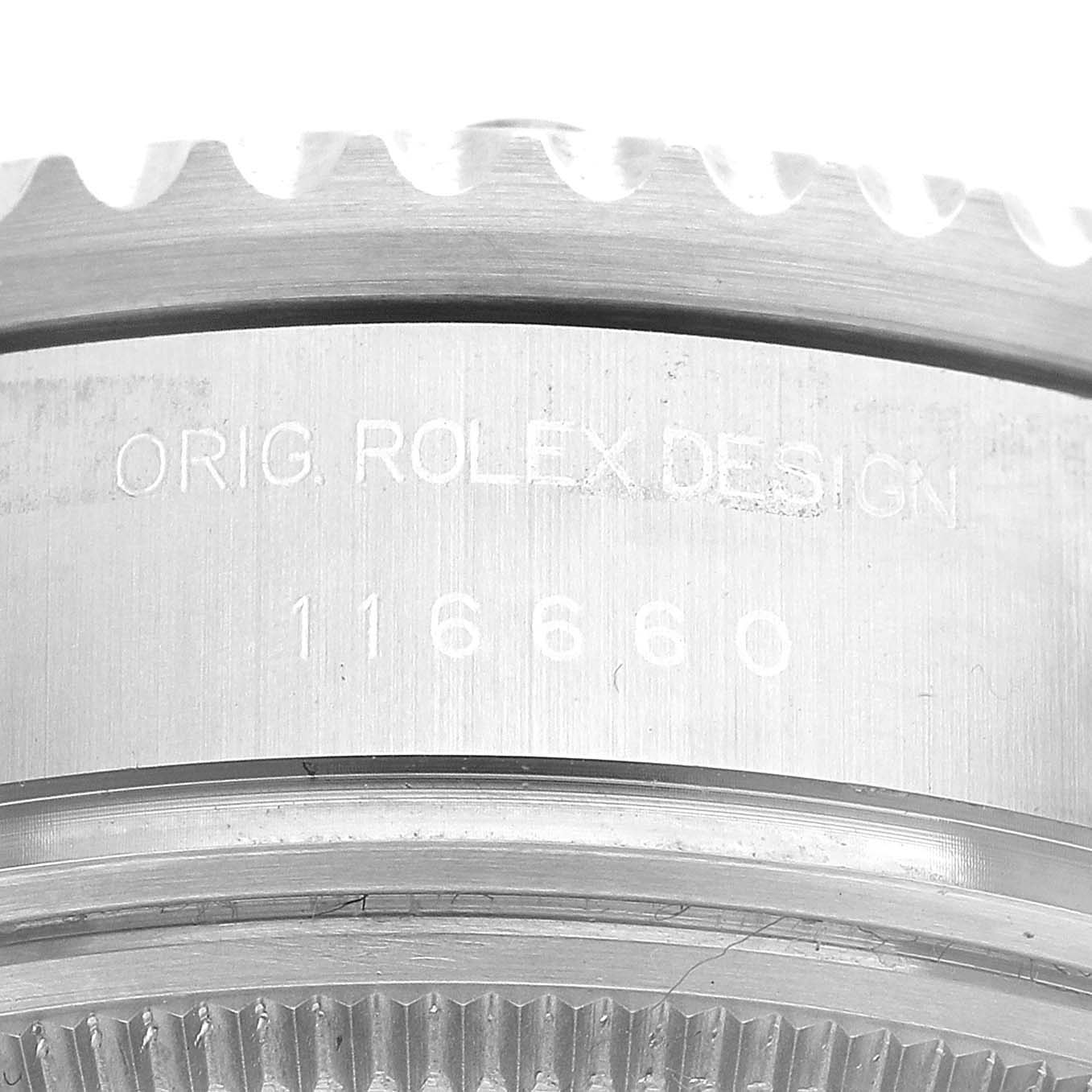 The image shows a close-up of the model number and part of the bezel of a Rolex Sea-Dweller 116660 Men
s Stainless Steel Black Dial 116660 Men
s Stainless Steel Black Dial watch.
