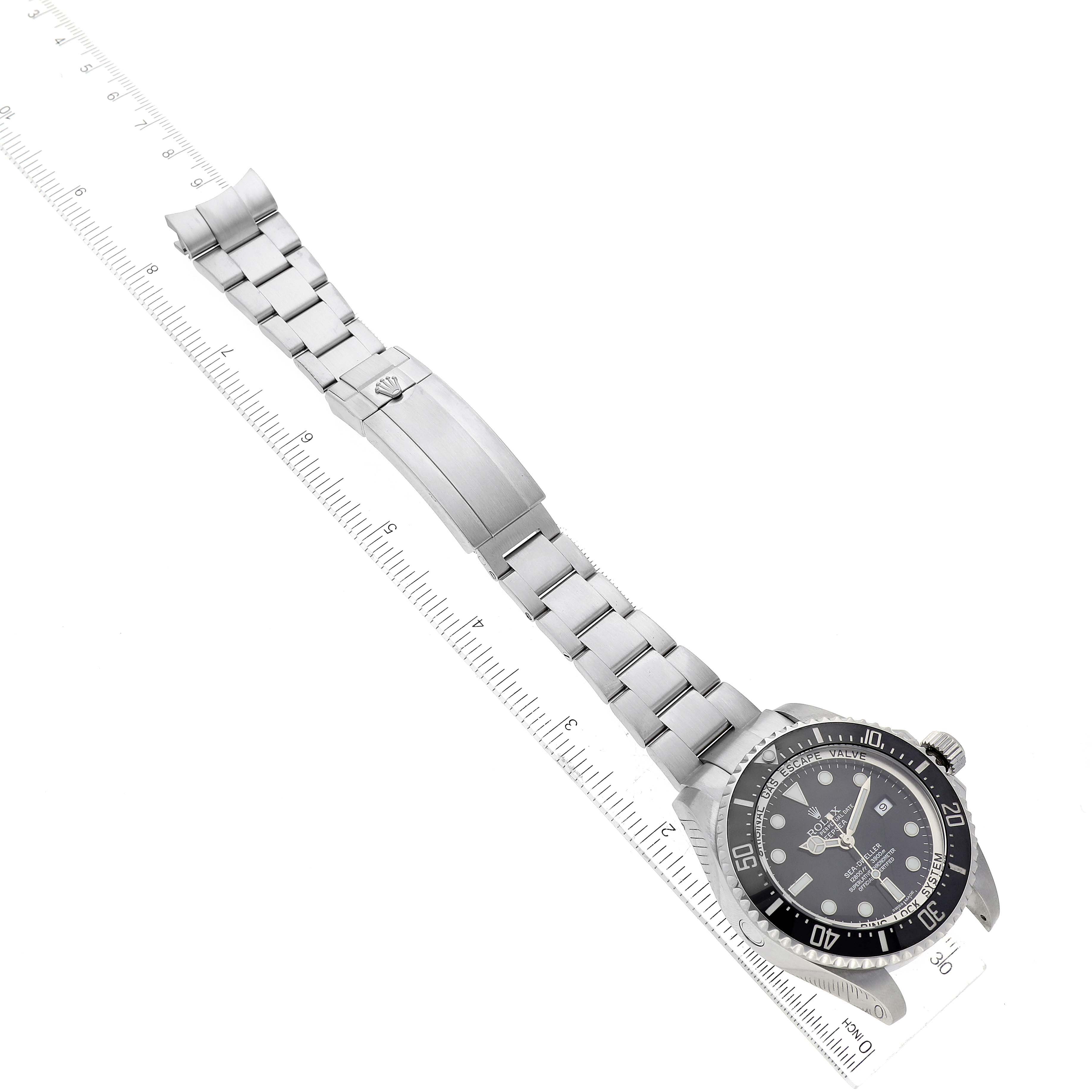 This image shows a top view of the Rolex Sea-Dweller 116660 Men
s Stainless Steel Black Dial 116660 Men
s Stainless Steel Black Dial watch, featuring the watch face, bezel, and bracelet with clasp.