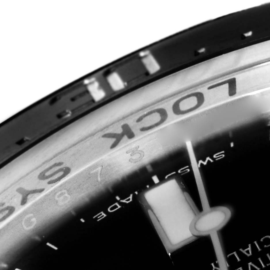 The image shows a close-up angle of the bezel and dial of the Rolex Sea-Dweller 116660 Men
s Stainless Steel Black Dial 116660 Men
s Stainless Steel Black Dial watch.