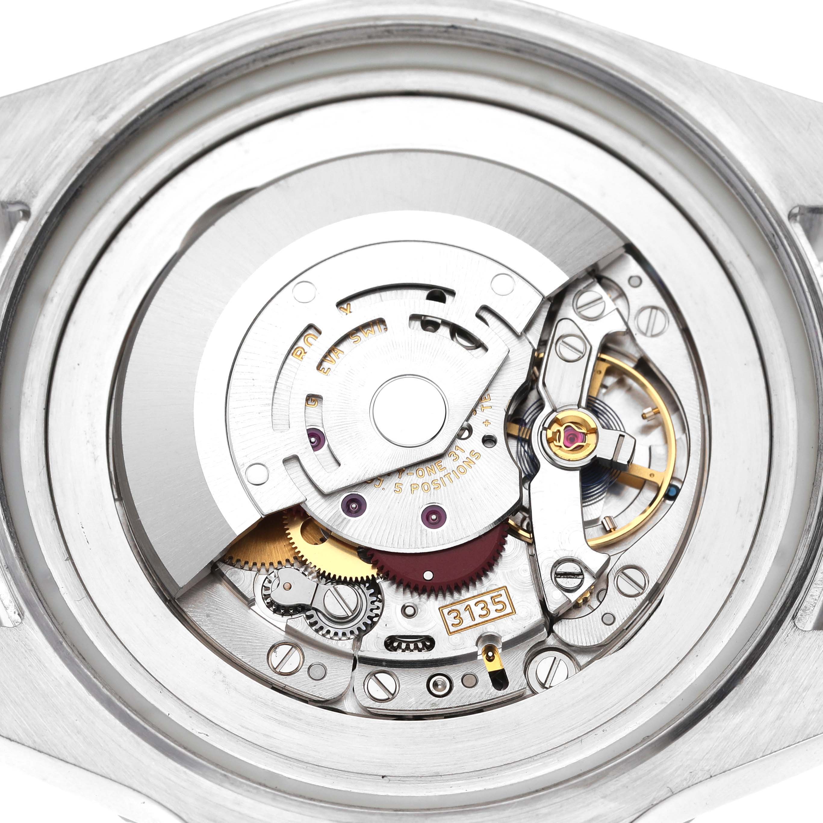 This image shows the internal mechanism and movement components of a Rolex Sea-Dweller 116660 Men
s Stainless Steel Black Dial 116660 Men
s Stainless Steel Black Dial watch from a detailed, close-up angle.