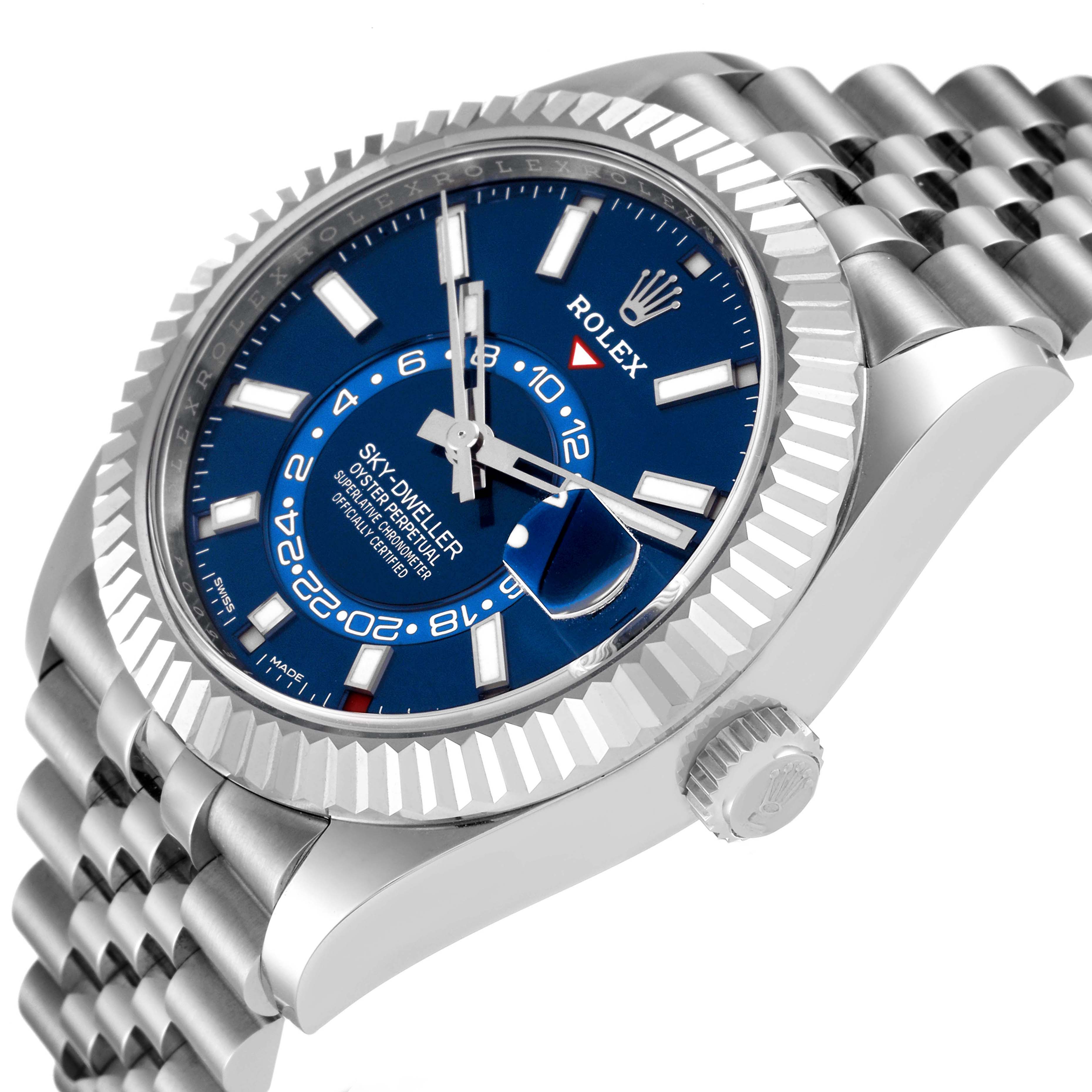 The Rolex Sky-Dweller 336934 Men's Stainless Steel Blue Dial watch is shown at an angled view, featuring its blue dial, fluted bezel, and part of the bracelet.