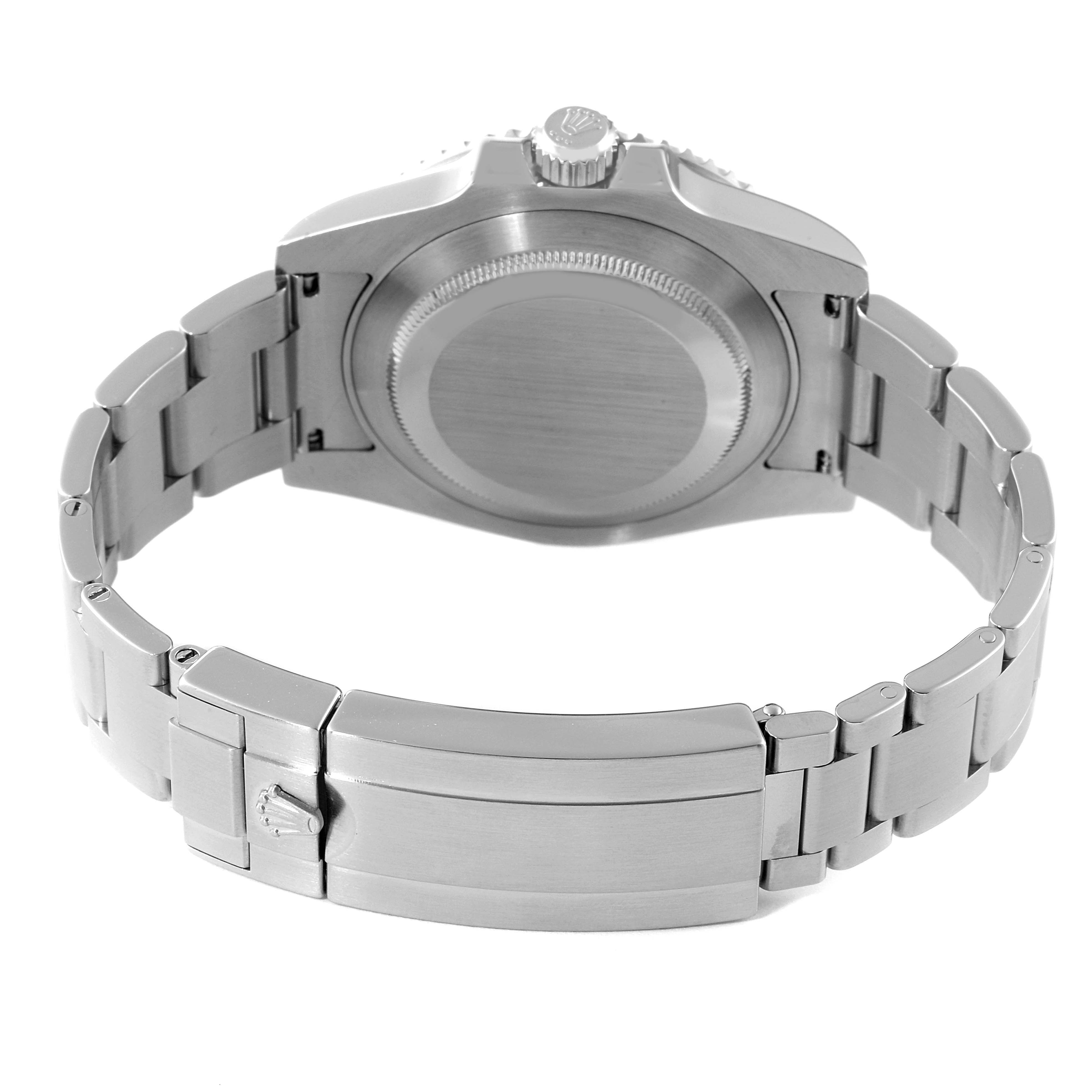 The image shows the underside of the Rolex Submariner 114060 Men's Stainless Steel Black Dial 114060 Men's Stainless Steel Black Dial watch, focusing on the bracelet and case back.