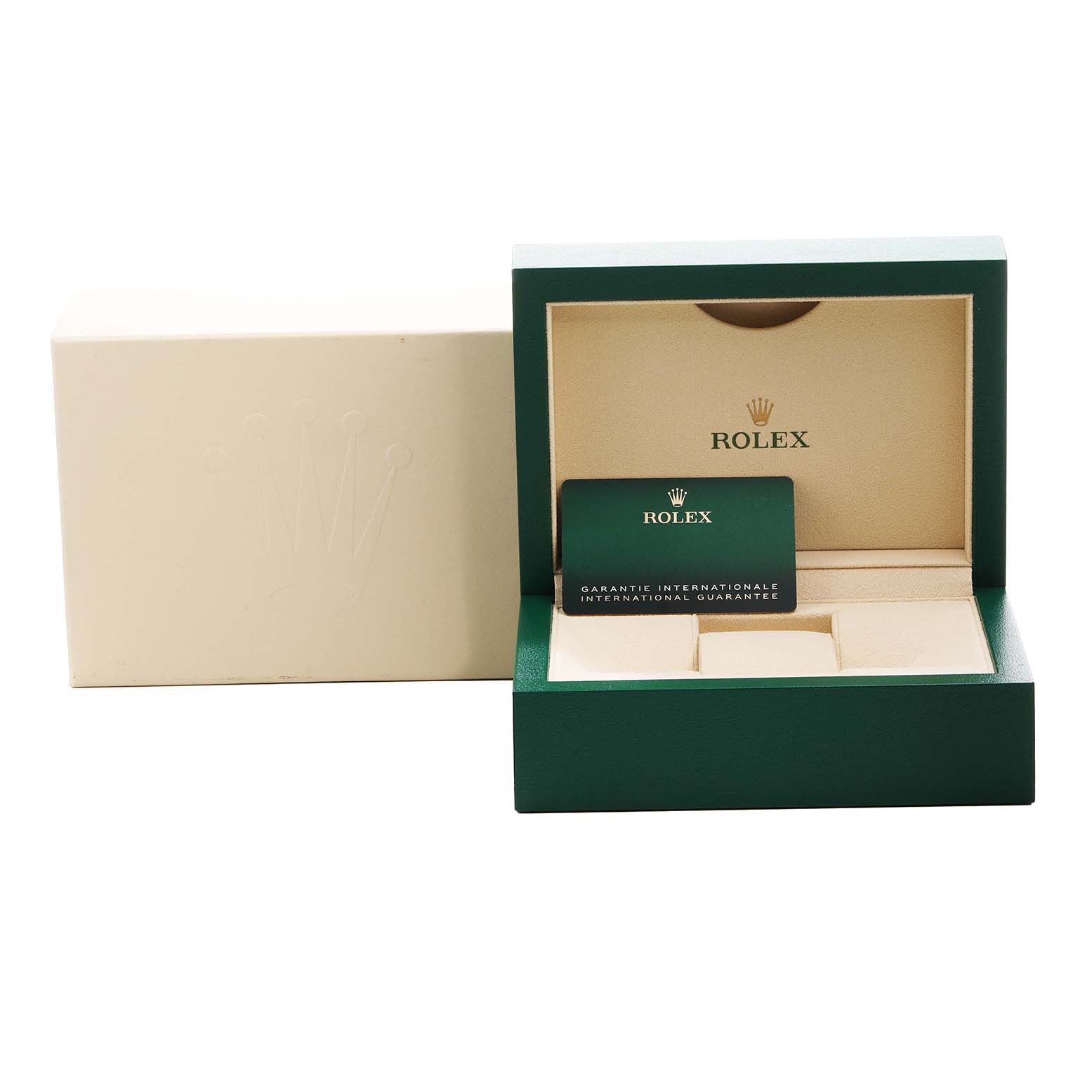 The image shows an open Rolex Submariner 126613LB Men's Steel and Gold (two tone) Blue Dial box, displaying a green warranty card inside.