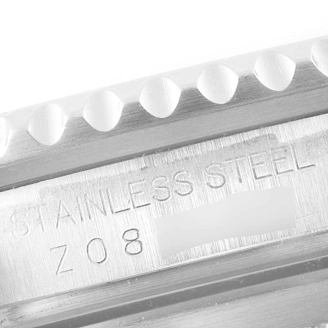 This photo shows a close-up of the stainless steel engraving on the side of the Rolex Submariner 16610 Men
s Stainless Steel Black Dial 16610 Men
s Stainless Steel Black Dial watch.