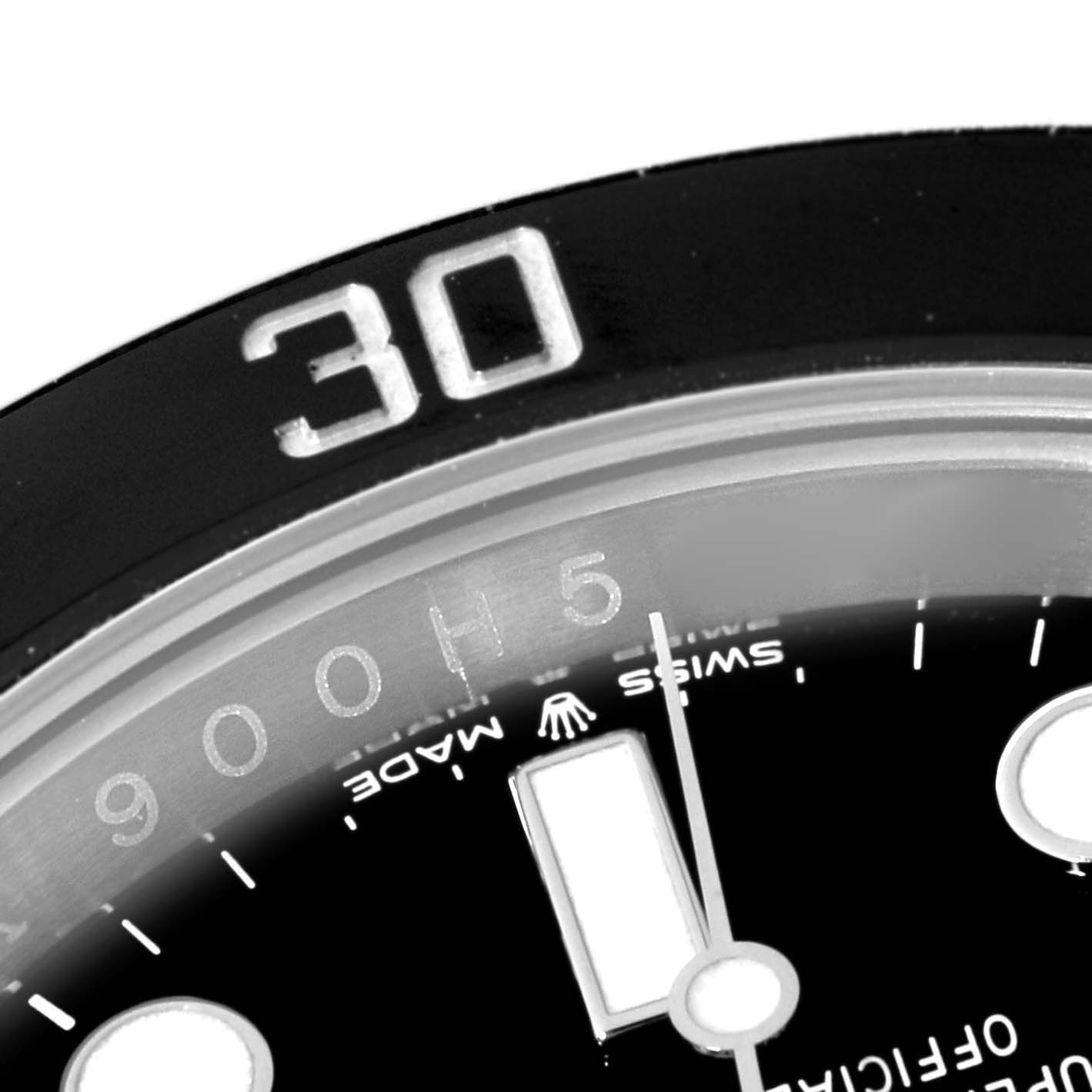 The image shows a close-up of the Rolex Submariner 126610 Men's Stainless Steel Black Dial's bezel and dial, highlighting the "30" mark and part of the hour markers.