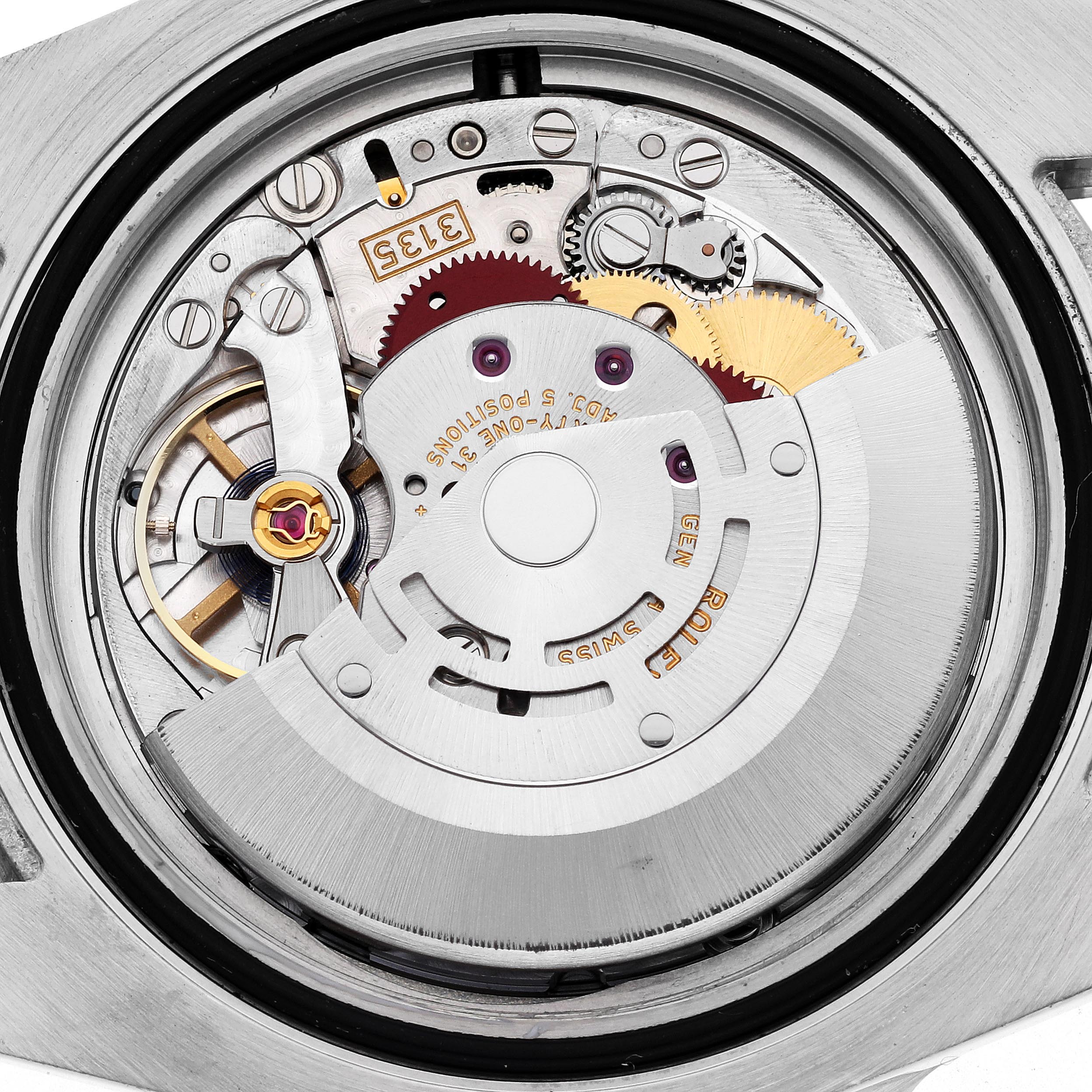 The image shows the movement of a Rolex Submariner 116610 Men
s Stainless Steel Green Dial 116610 Men
s Stainless Steel Green Dial, highlighting gears and mechanical parts from a top-down view.