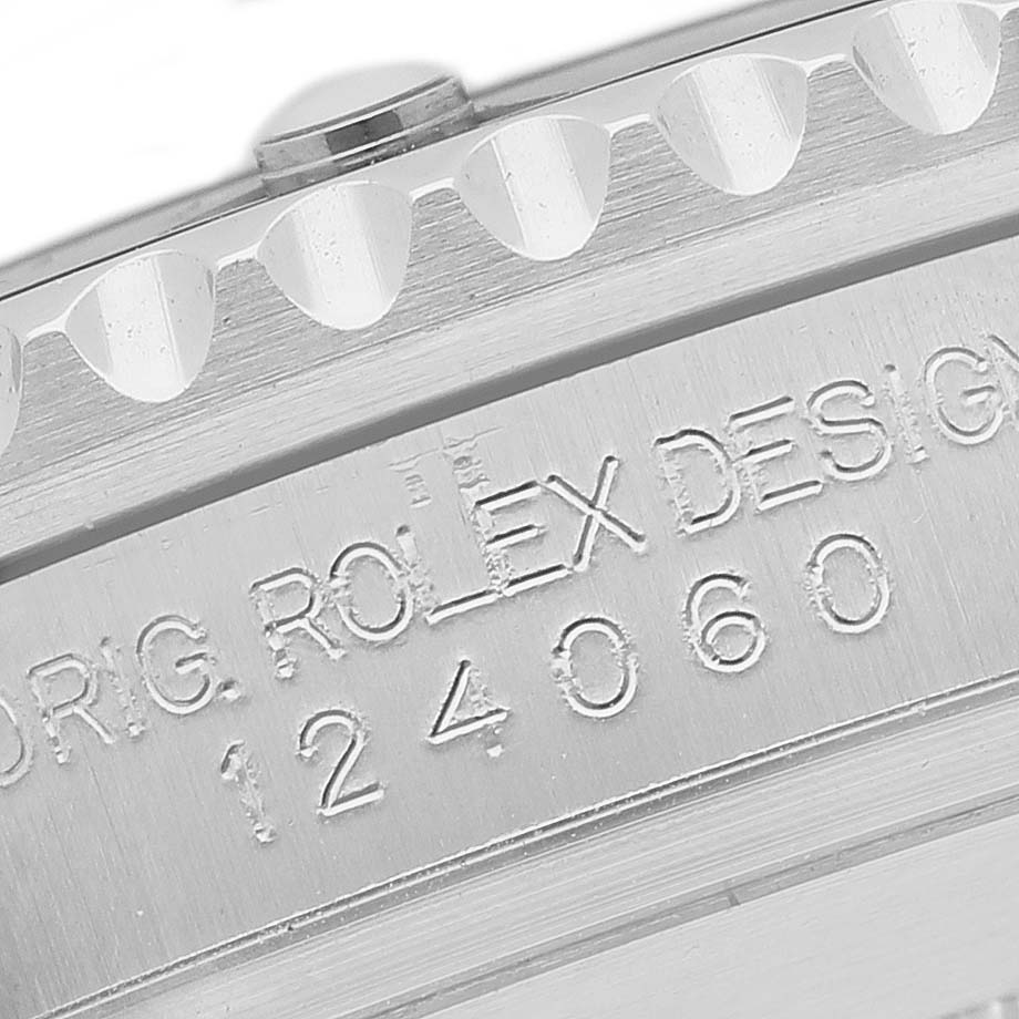 The image shows a close-up angle of the side of a Rolex Submariner 124060 Men's Stainless Steel Black Dial, displaying the model and brand engraving.