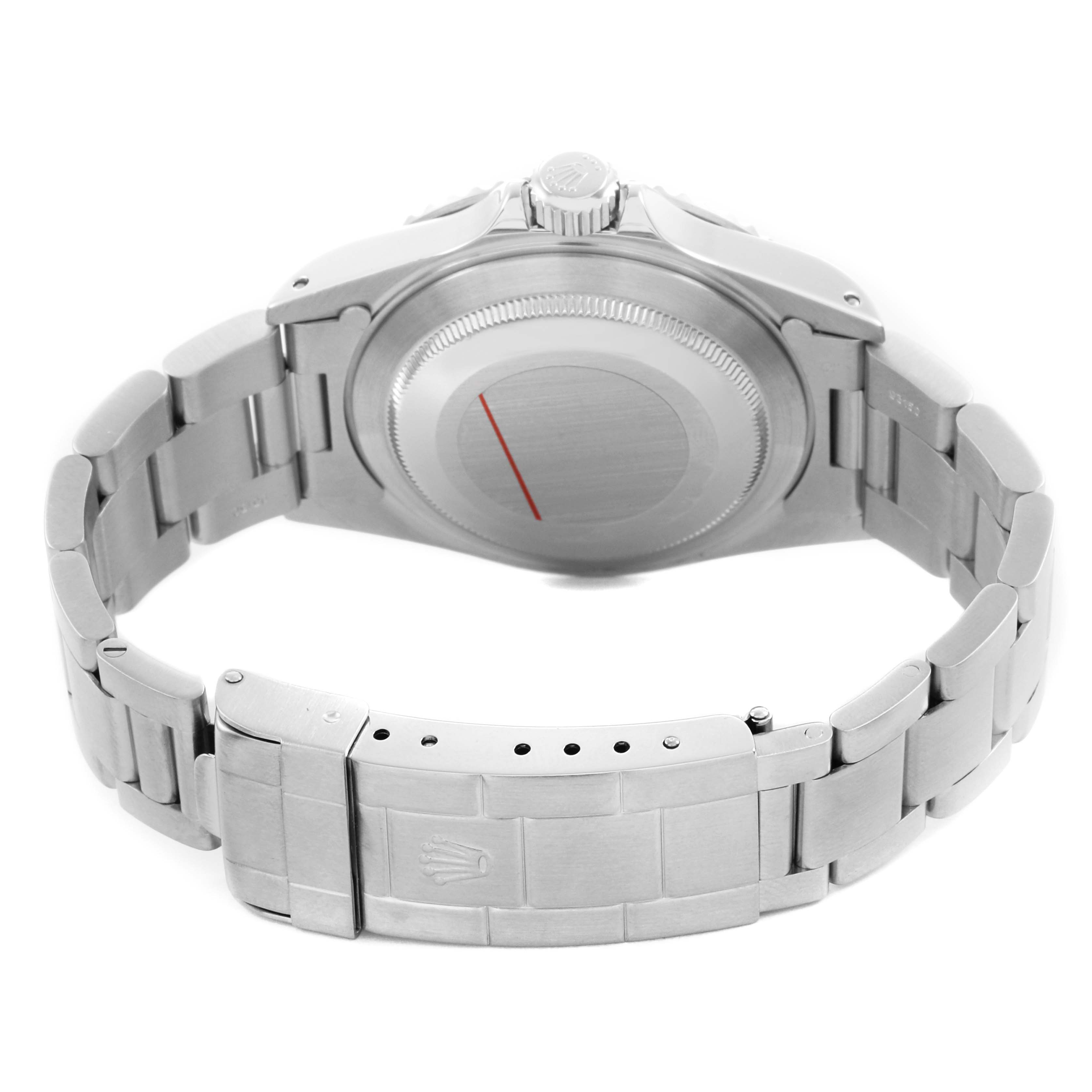 The image shows the backside of a Rolex Submariner 14060M Mens Stainless Steel Black Dial, highlighting the case back, clasp, and bracelet links.