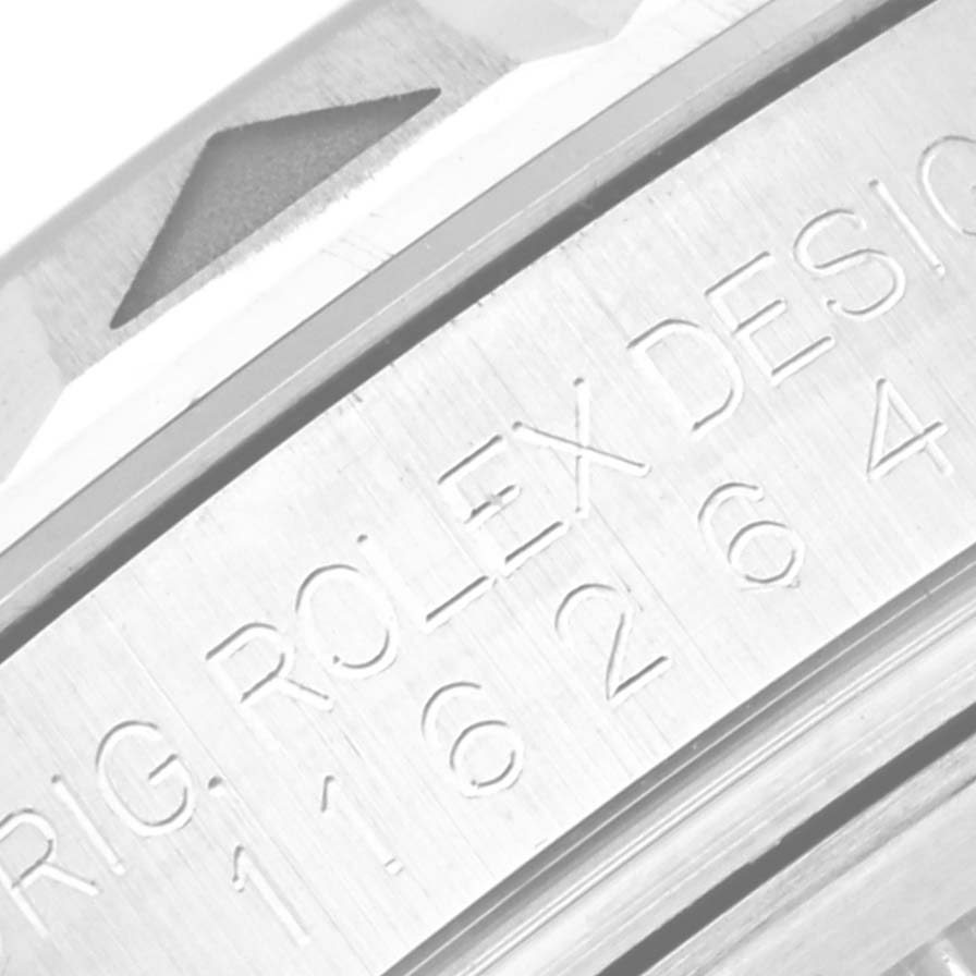 This image shows an engraving on the side of the bezel and case of a Rolex Turn-o-Graph 116264 Men
s Stainless Steel White Dial 116264 Men
s Stainless Steel White Dial watch.