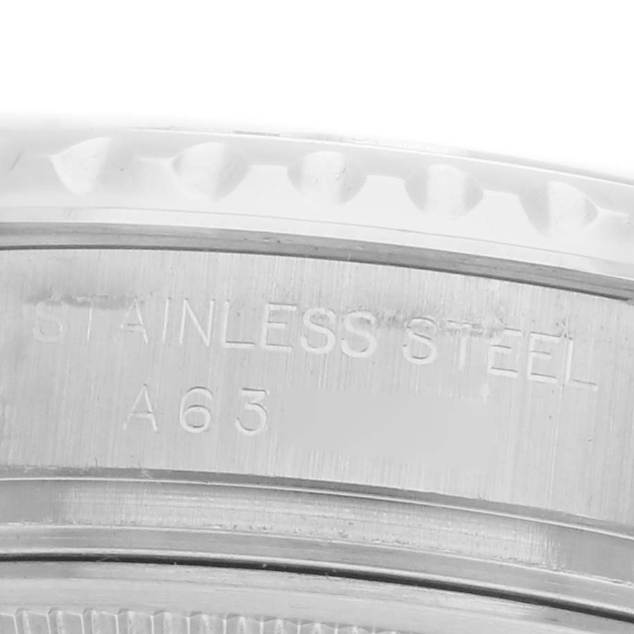 The image shows a close-up angle of the stainless steel case back of a Rolex Yacht-Master 169622 Women
s Platinum Silver Dial 169622 Women
s Platinum Silver Dial with engraving details.