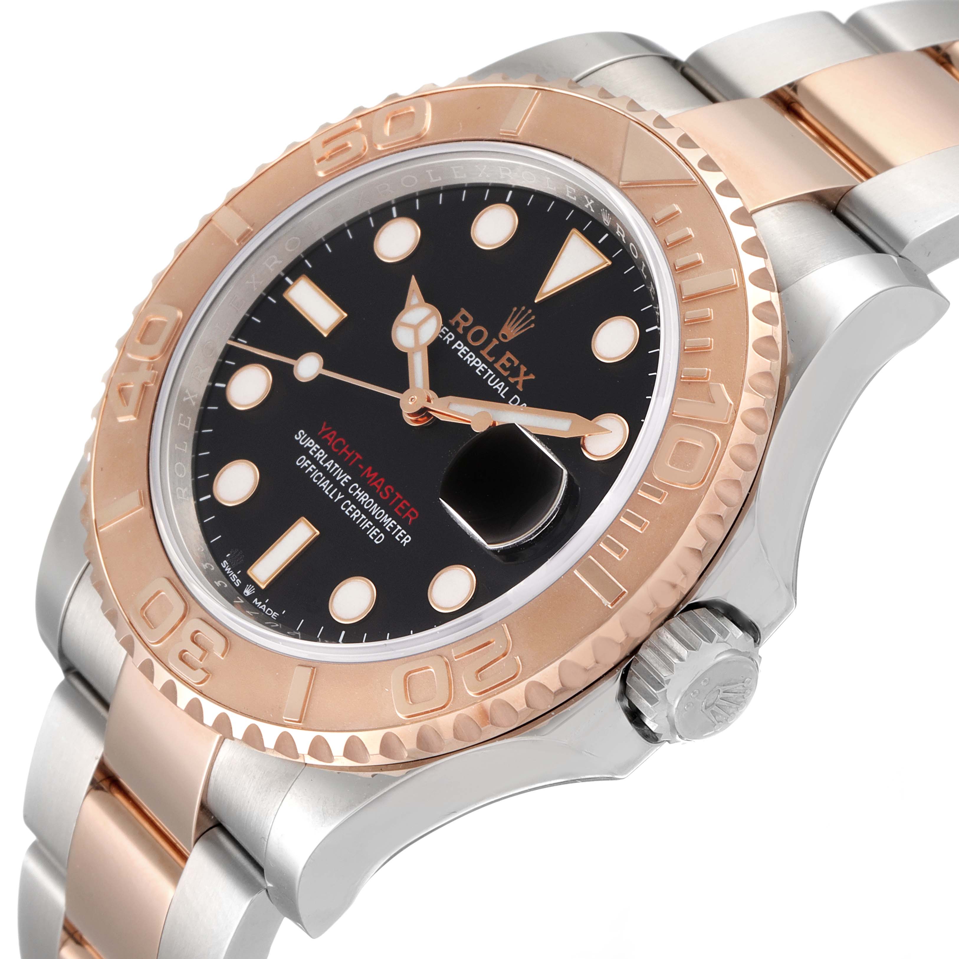 The image shows a close-up of a Rolex Yacht-Master 126621 Men
s Steel and Gold (two tone) Black Dial 126621 Men
s Steel and Gold (two tone) Black Dial watch, highlighting the dial, bezel, crown, and bracelet at a slight angle.
