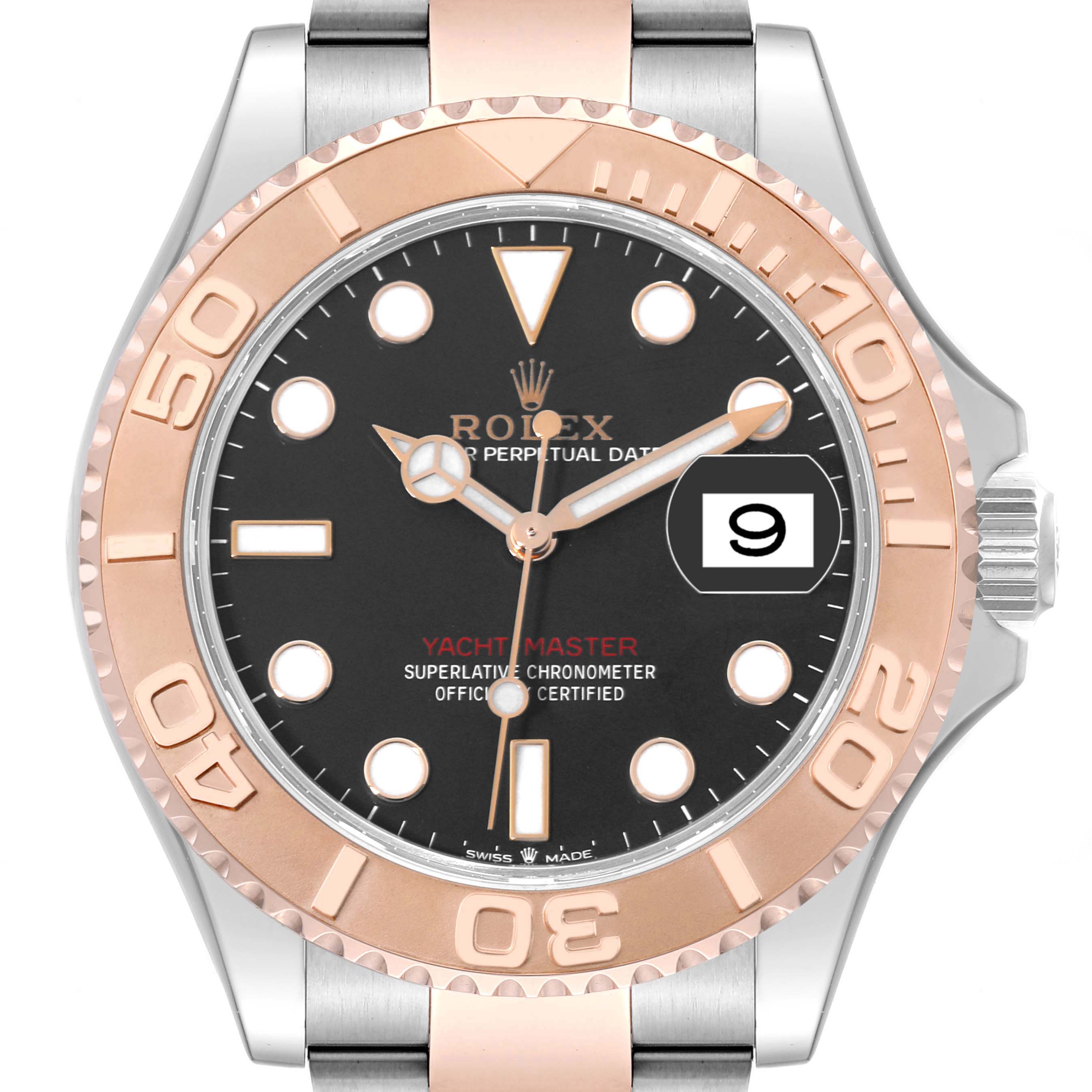 This Rolex Yacht-Master 126621 Men
s Steel and Gold (two tone) Black Dial 126621 Men
s Steel and Gold (two tone) Black Dial watch is shown from a front-facing angle, featuring its dial, bezel, hands, and partial bracelet.