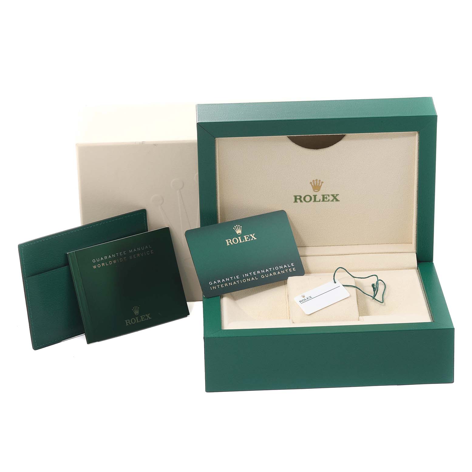 The image shows the open packaging of a Rolex Yacht-Master 126621 Men
s Steel and Gold (two tone) Black Dial 126621 Men
s Steel and Gold (two tone) Black Dial watch with its box, manuals, and guarantee card.