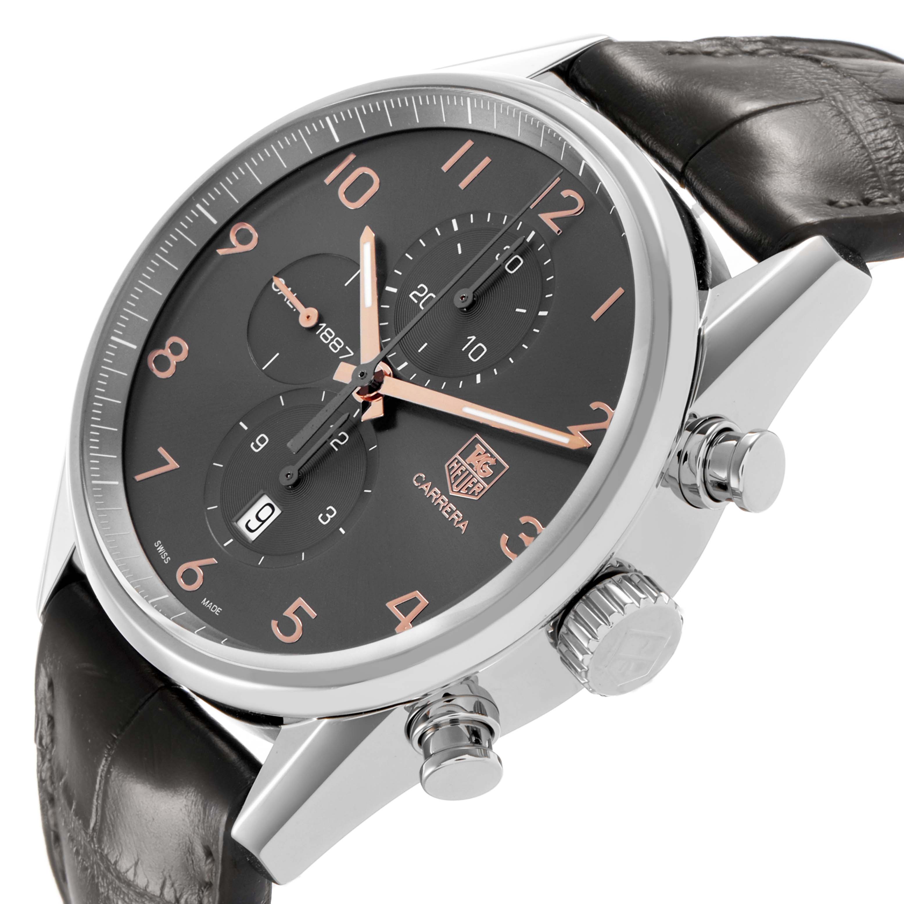 The image shows a TAG Heuer Carrera watch at a side angle, highlighting its dial, crown, pushers, and leather strap.