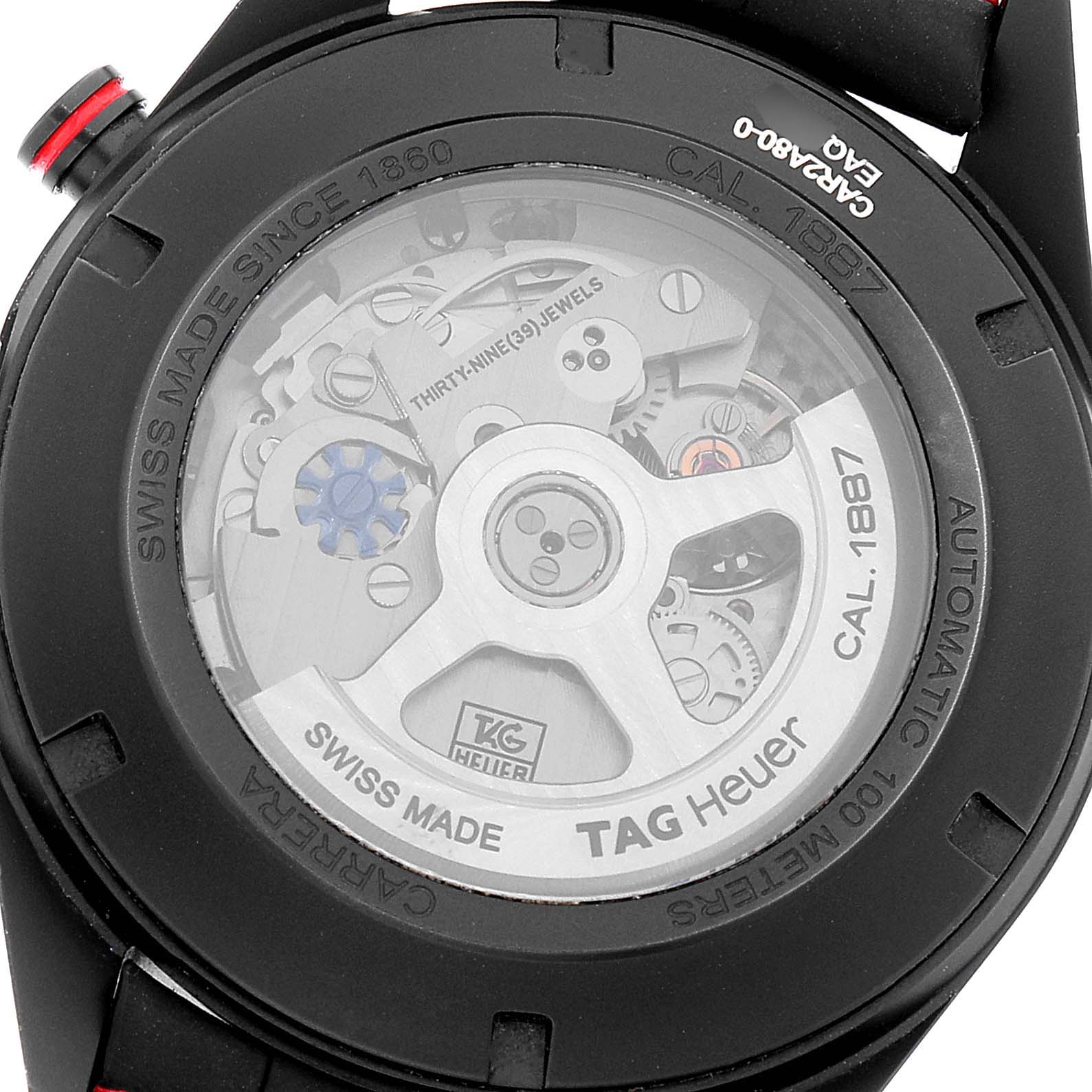 The image shows the rear view of a Tag Heuer Carrera CAR2A80-FC6237 Men's Titanium Black Dial CAR2A80-FC6237 Men's Titanium Black Dial watch, highlighting its automatic movement and internal mechanisms.