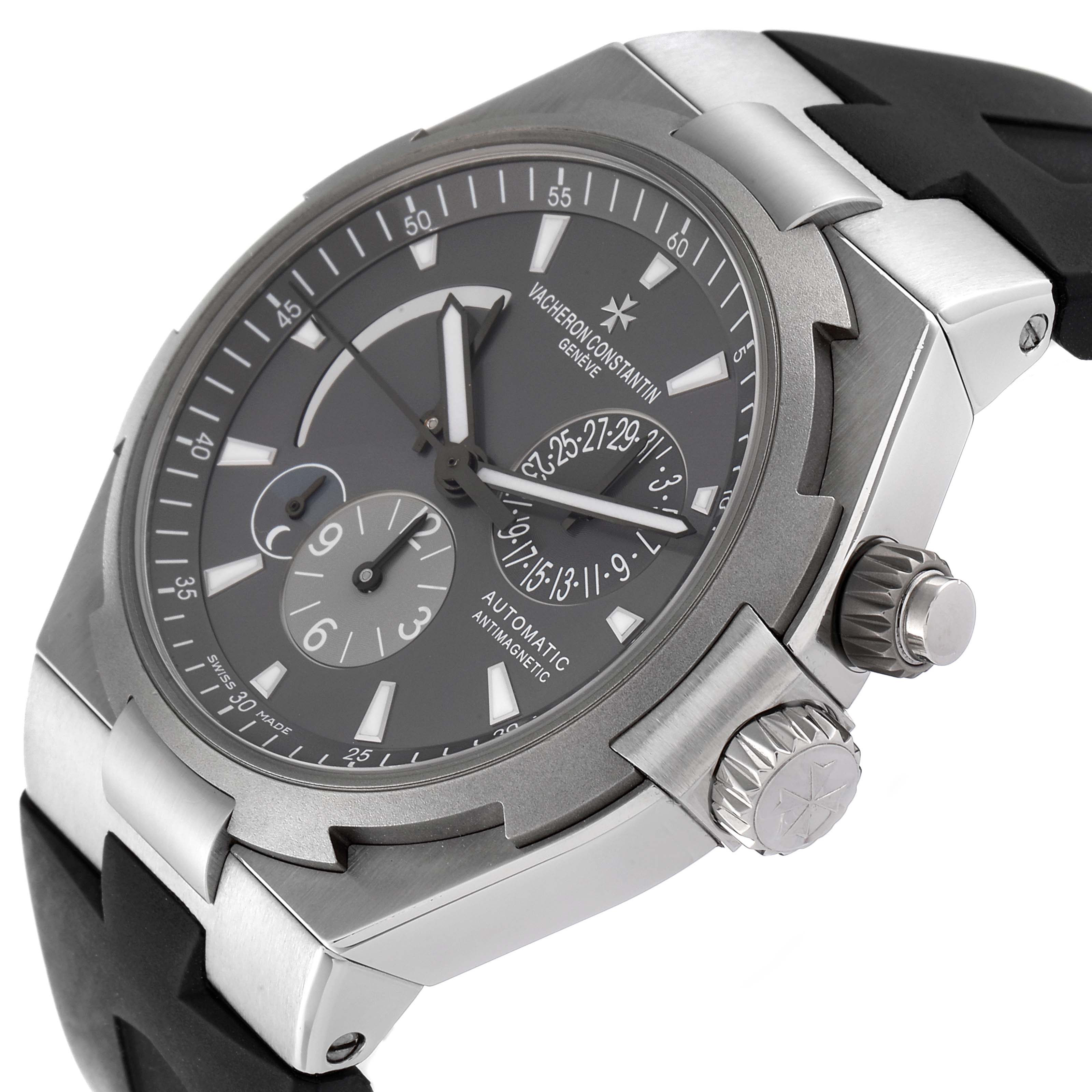 This image shows a Vacheron Constantin Overseas 47450/000W-9511 Men
s Stainless Steel Black Dial 47450/000W-9511 Men
s Stainless Steel Black Dial watch at a three-quarter angle, highlighting the dial, crown, and part of the strap.