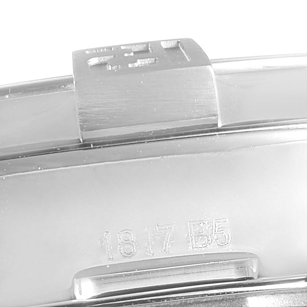 The image shows a close-up of the strap clasp and part of the back of a Breitling Avenger A3239011-C872-170A  Men's Stainless Steel Mother of Pearl Dial A3239011-C872-170A  Men's Stainless Steel Mother of Pearl Dial watch, highlighting the engraved serial number.