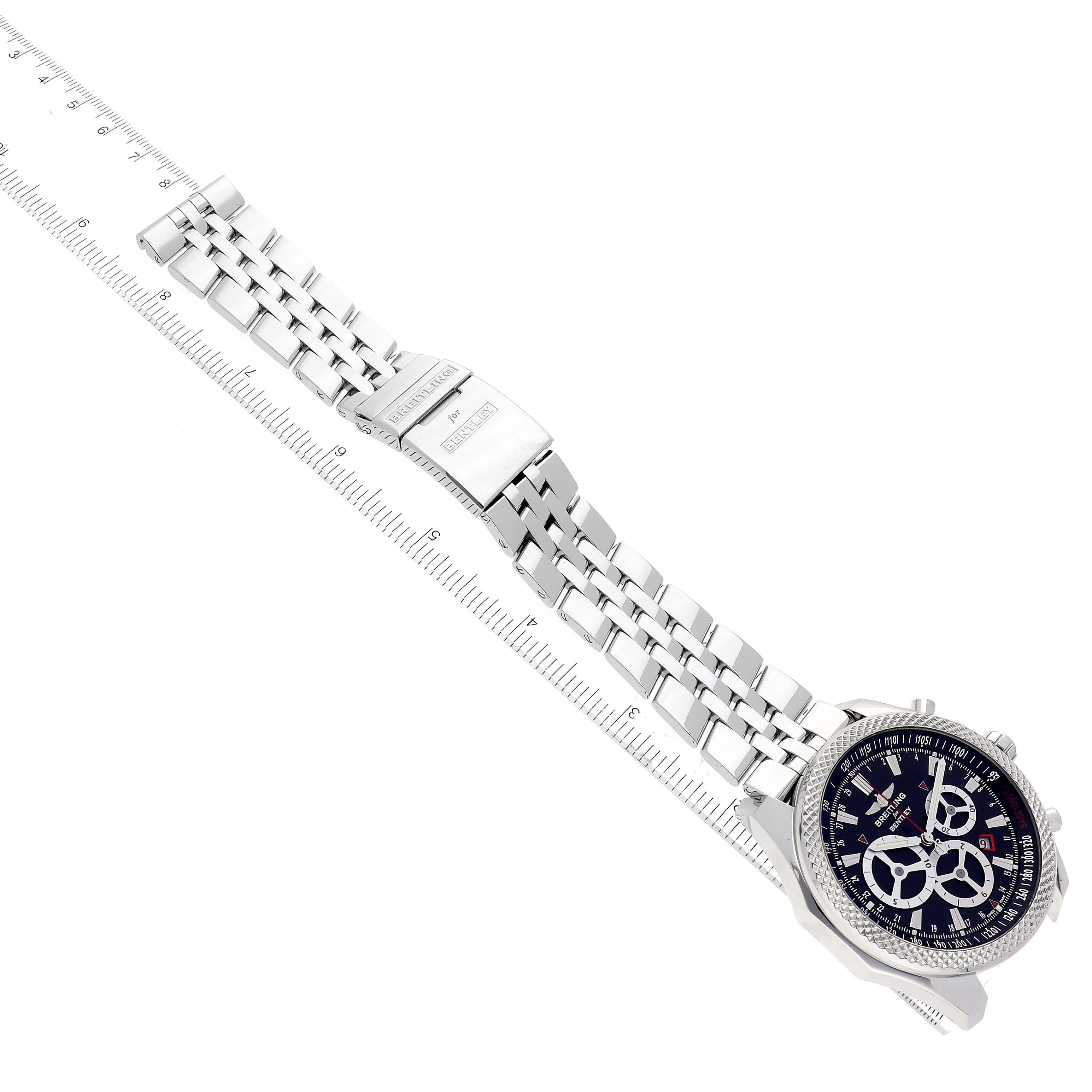 The image shows a Breitling Bentley A25366 Men's Stainless Steel Black Dial A25366 Men's Stainless Steel Black Dial model watch laid flat, highlighting its bracelet, clasp, and face, aligned with a ruler for scale.