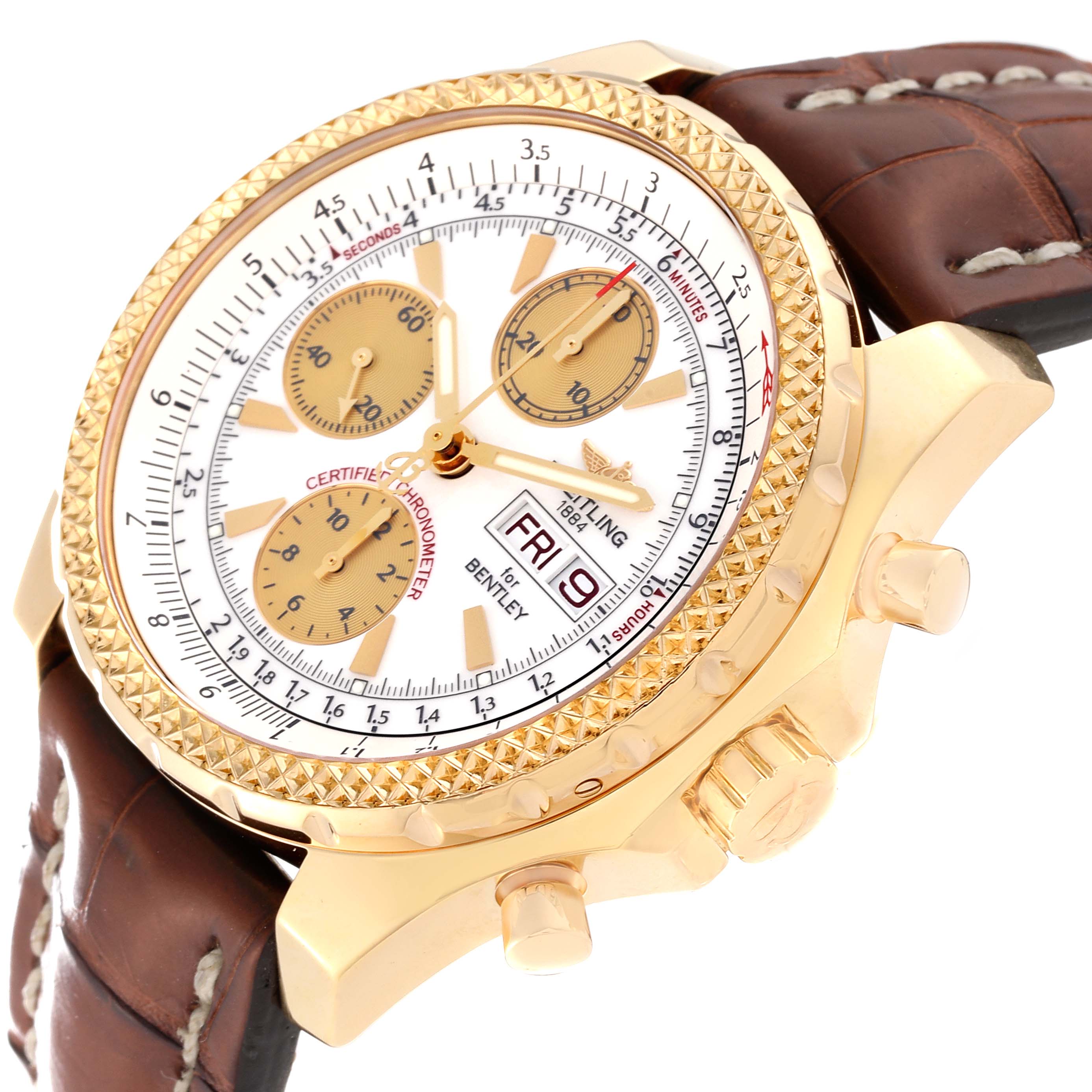The Breitling Bentley K13362 Men's Yellow Gold White Dial K13362 Men's Yellow Gold White Dial watch is shown at an oblique angle, highlighting its gold case, dial, pushers, and brown leather strap.