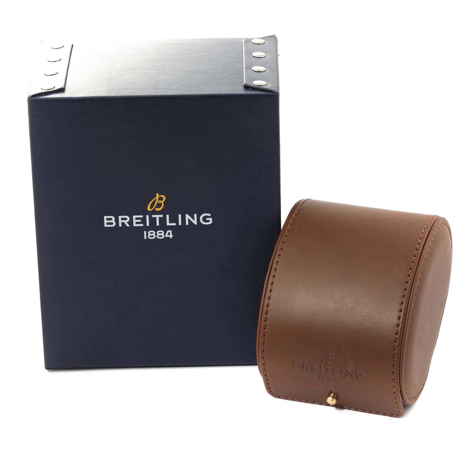 The image shows a Breitling Bentley K13362 Men's Yellow Gold White Dial K13362 Men's Yellow Gold White Dial watch box and a brown leather travel case, both branded with the Breitling logo.