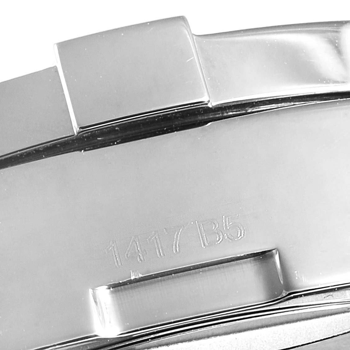 The image shows a close-up of the metallic strap links and engraved clasp from the Breitling Colt A13035 Men's Stainless Steel Blue Dial A13035 Men's Stainless Steel Blue Dial watch.