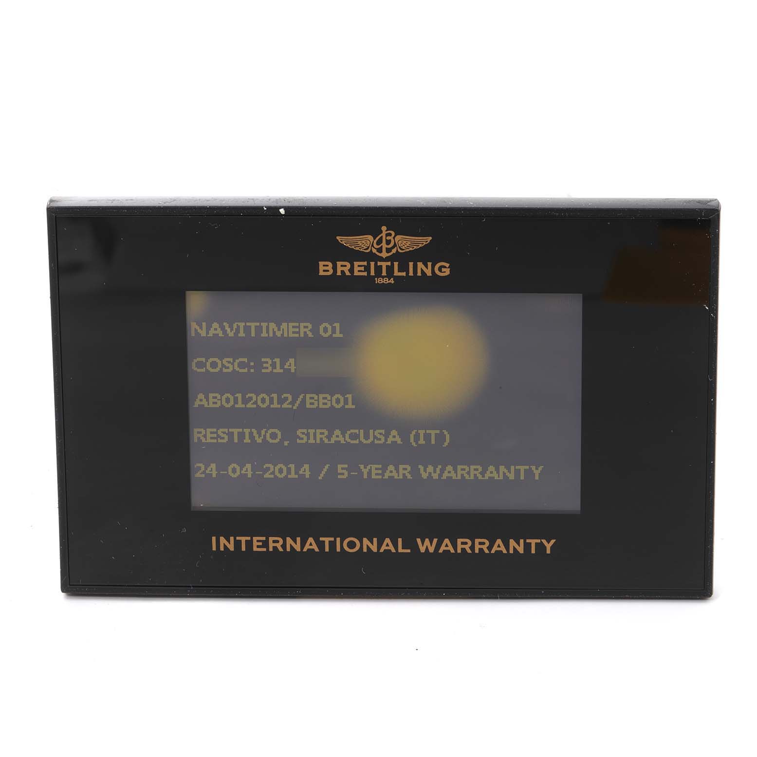The image shows the international warranty card for a Breitling Navitimer AB0120 Men
s Stainless Steel Black Dial AB0120 Men
s Stainless Steel Black Dial 01 watch.