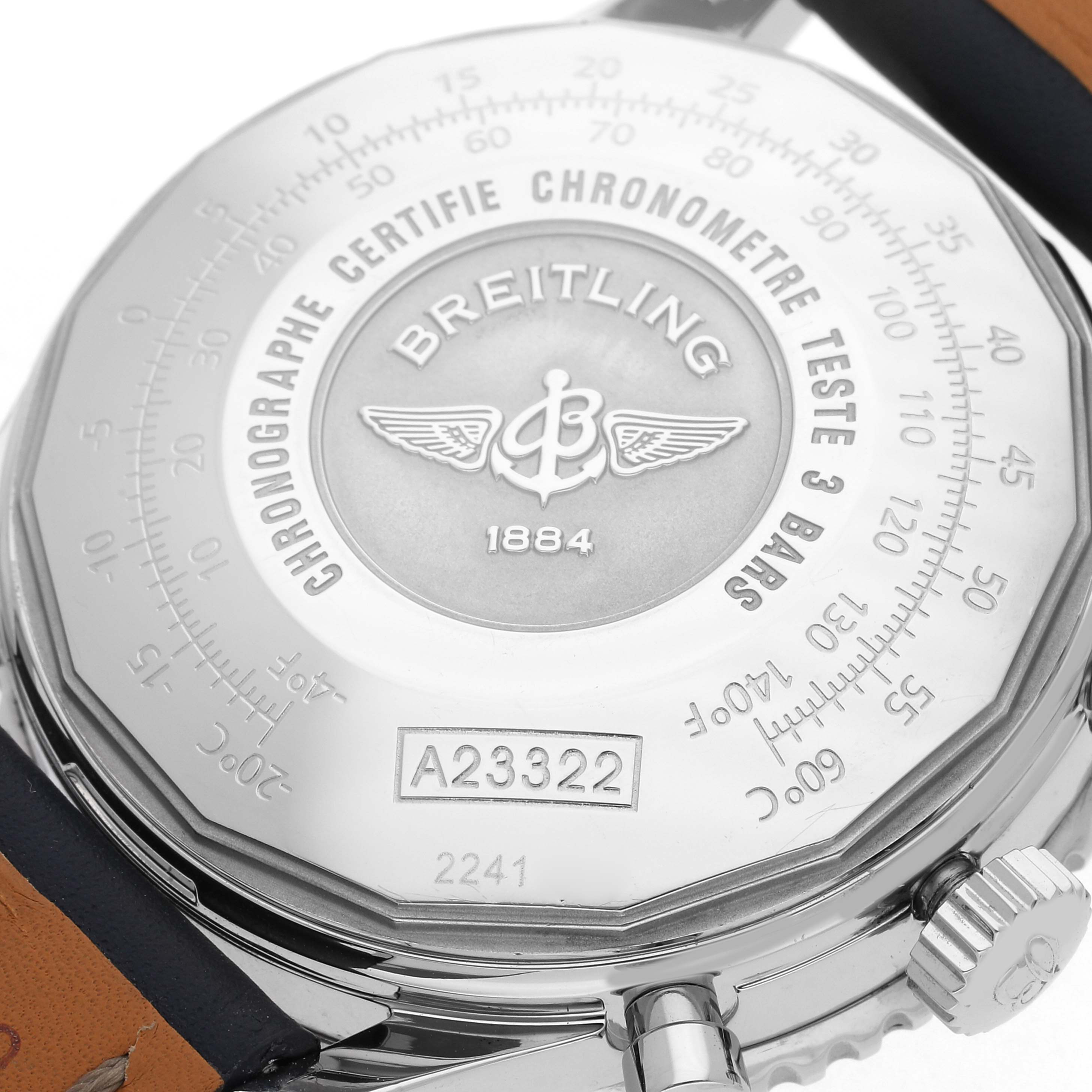 The image shows the back case and part of the strap of a Breitling Navitimer A23322 Men's Stainless Steel Black Dial A23322 Men's Stainless Steel Black Dial, focusing on engravings and the model number.