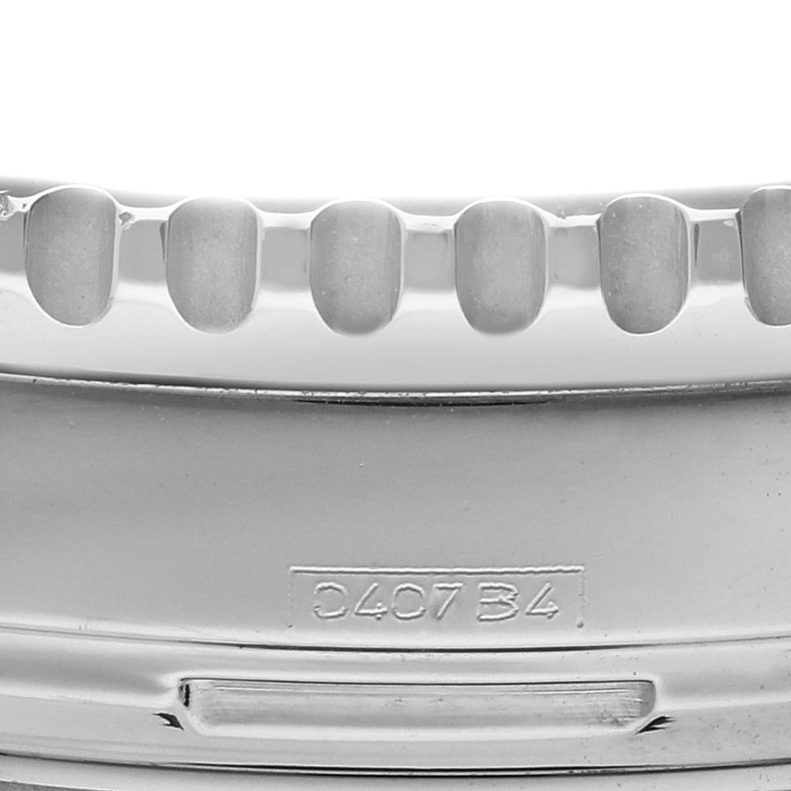 The image shows a close-up of the bezel and markings on the Breitling Navitimer A23322 Men's Stainless Steel Black Dial A23322 Men's Stainless Steel Black Dial watch from a side angle.